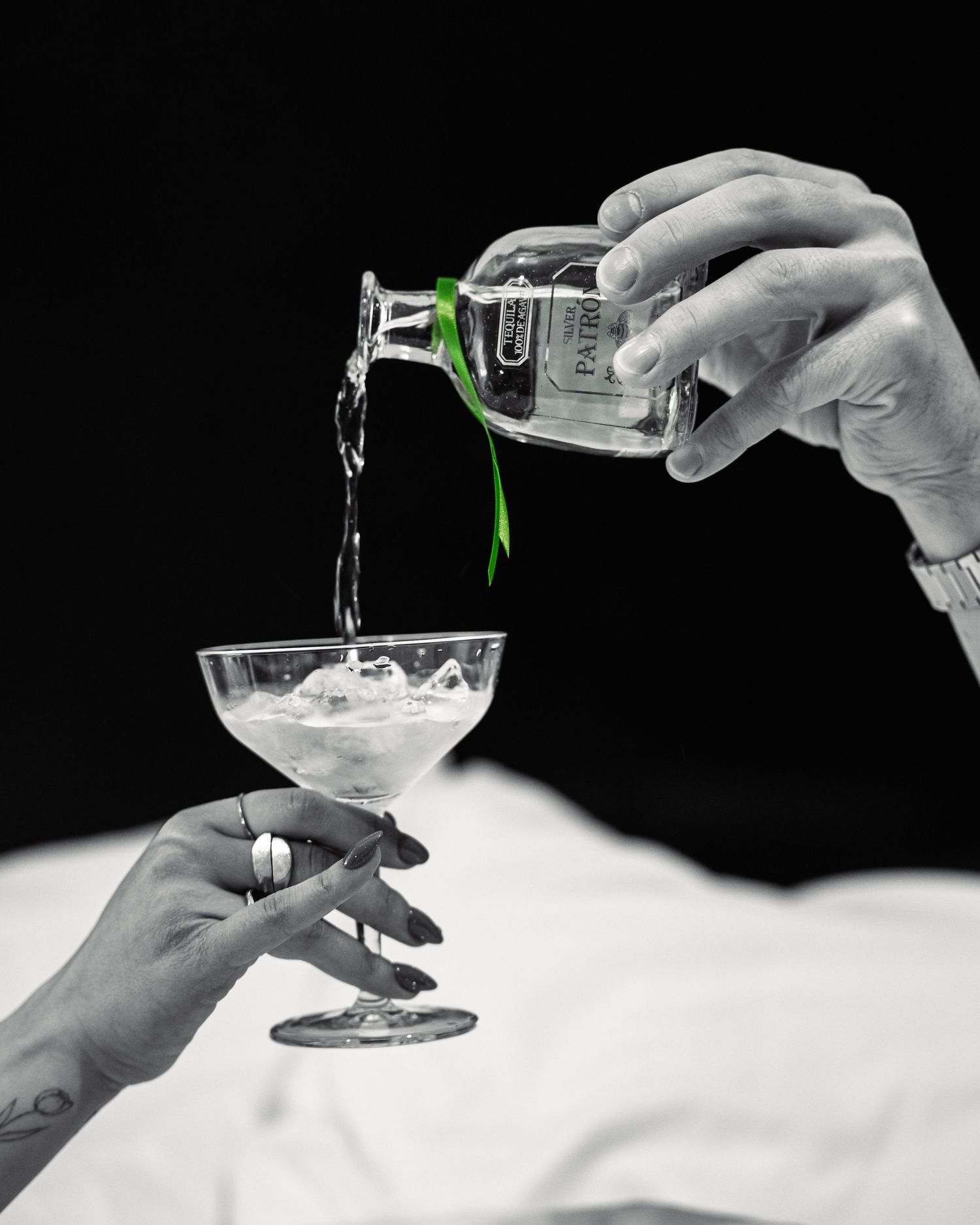 Couple pouring Bacardi in a hotel room.   © Jack Curtis Photography.