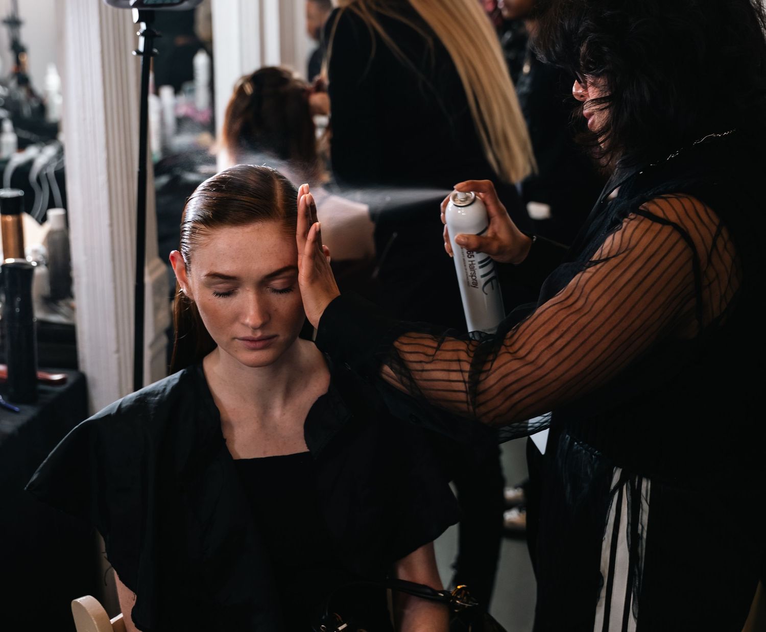 Spray of production. Art Hearts Fashion backstage photography NYFW 2025.   © Jack Curtis Photography.