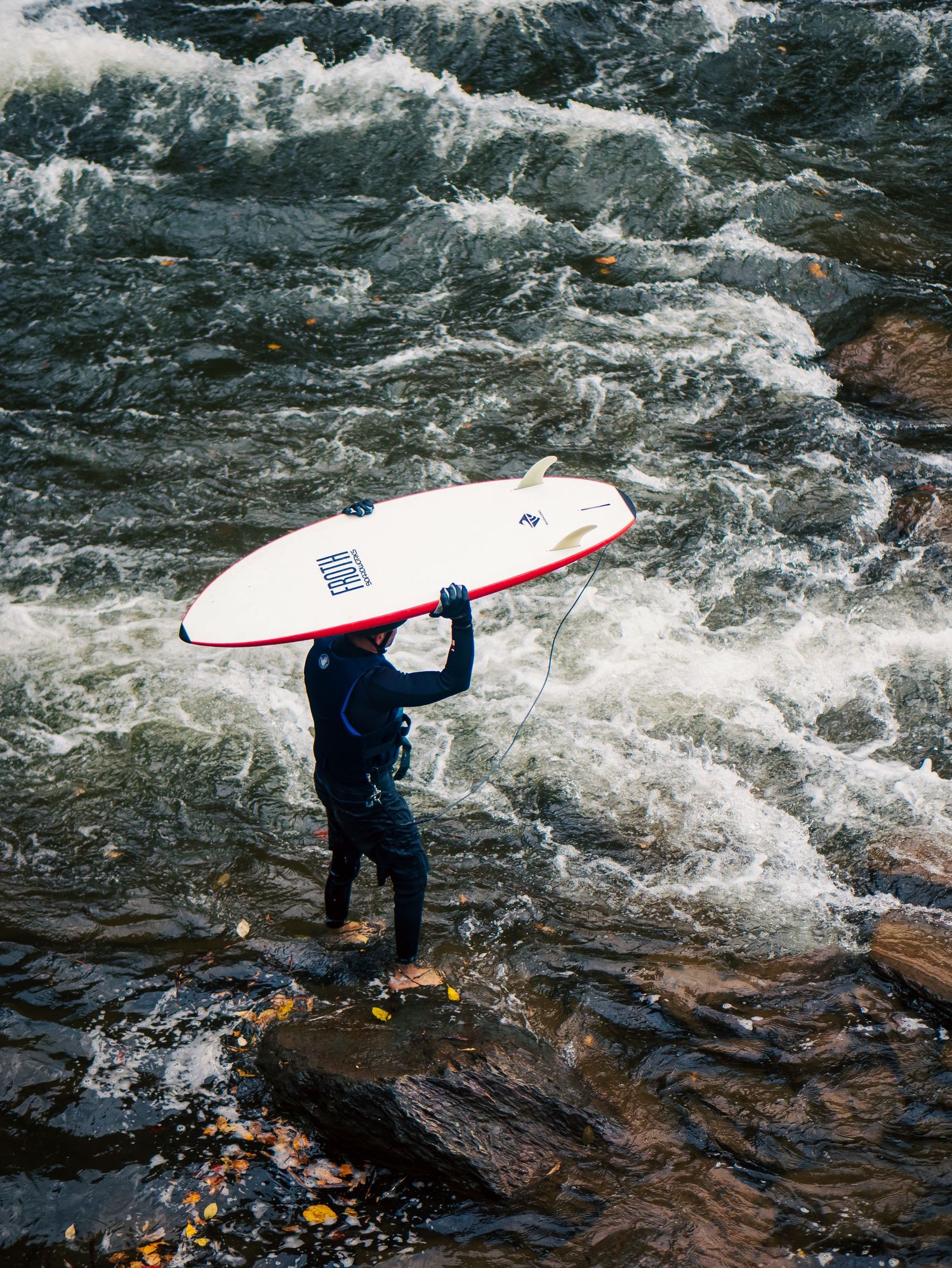 An unlikely place for a surfboard. A river surfer at the Ocoee River's Hell Hole during Fall 2024. © Jack Curtis Photography.