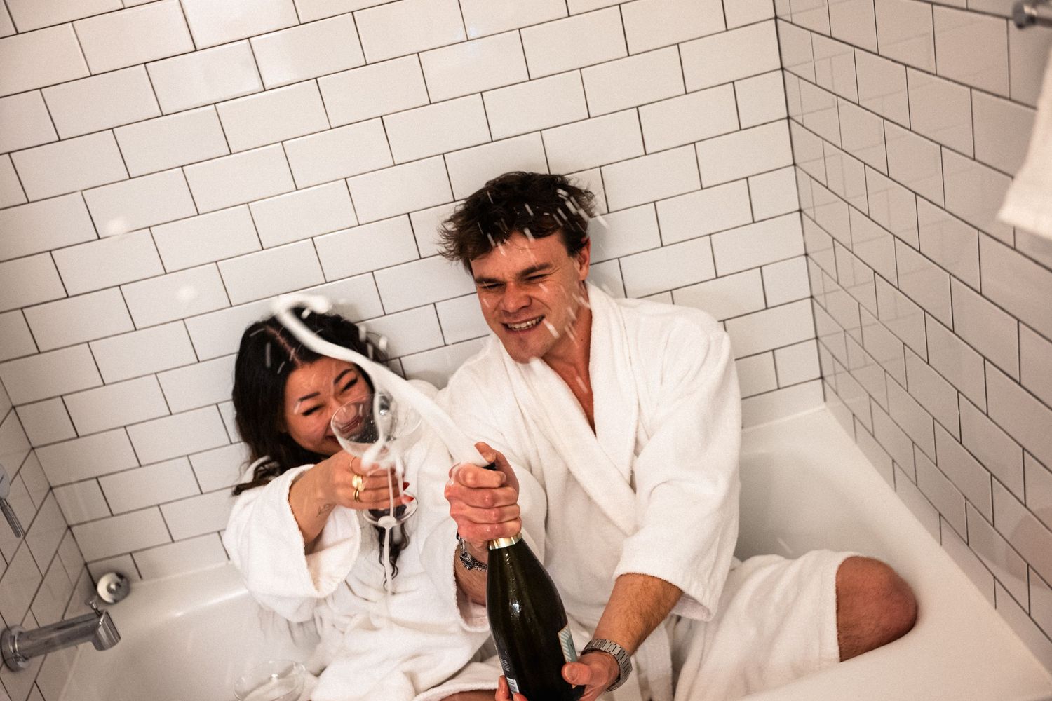 Popping champagne at The Gregorian.  © Jack Curtis Photography.