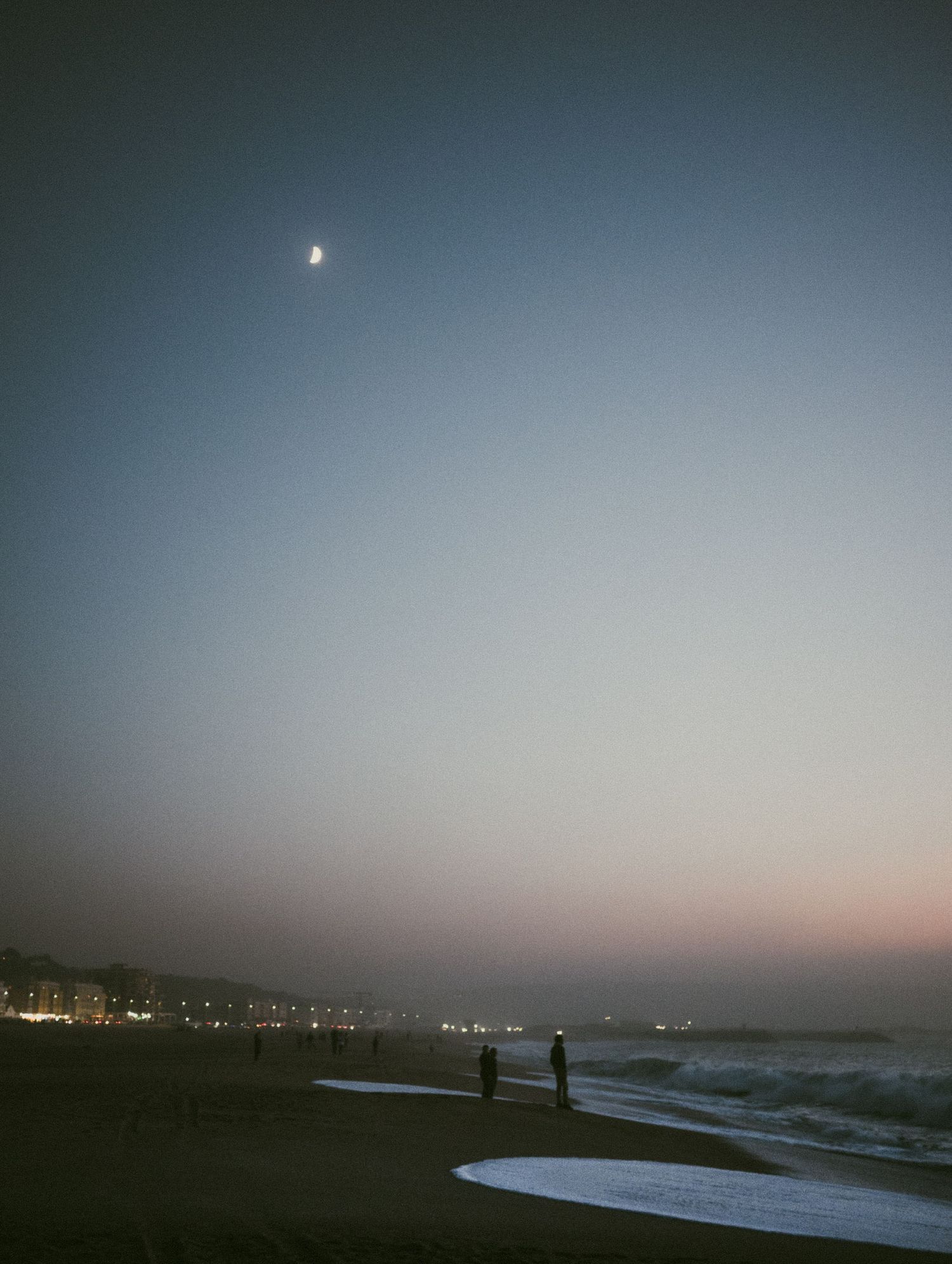 Hues of a dream. Blue hour on a beach at Nazare, Portugal during Autumn 2023. © Jack Curtis Photography.
