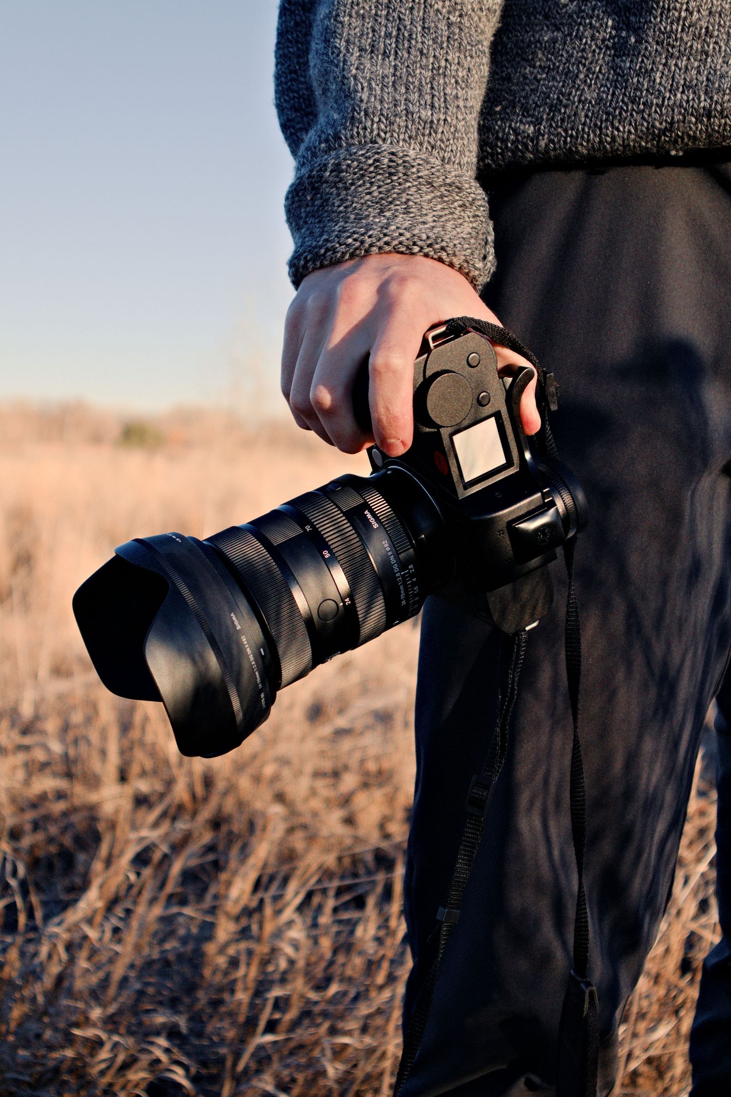 Jack Curtis holding his trusty Leica SL2-S. © Jack Curtis Photography.
