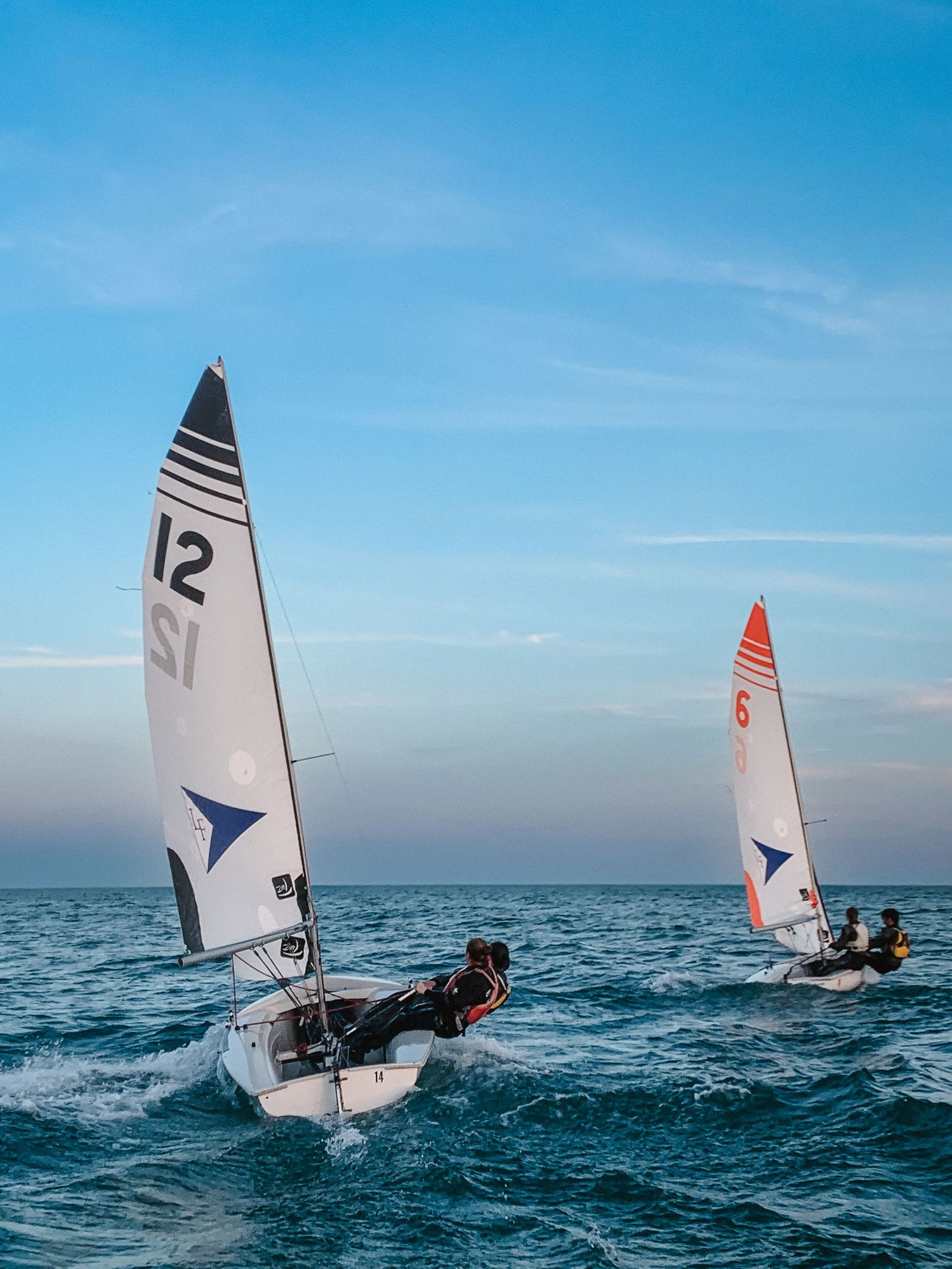 Afternoon collegiate racing. Lake Forest College Sailing Team during Fall 2022.  © Jack Curtis Photography.