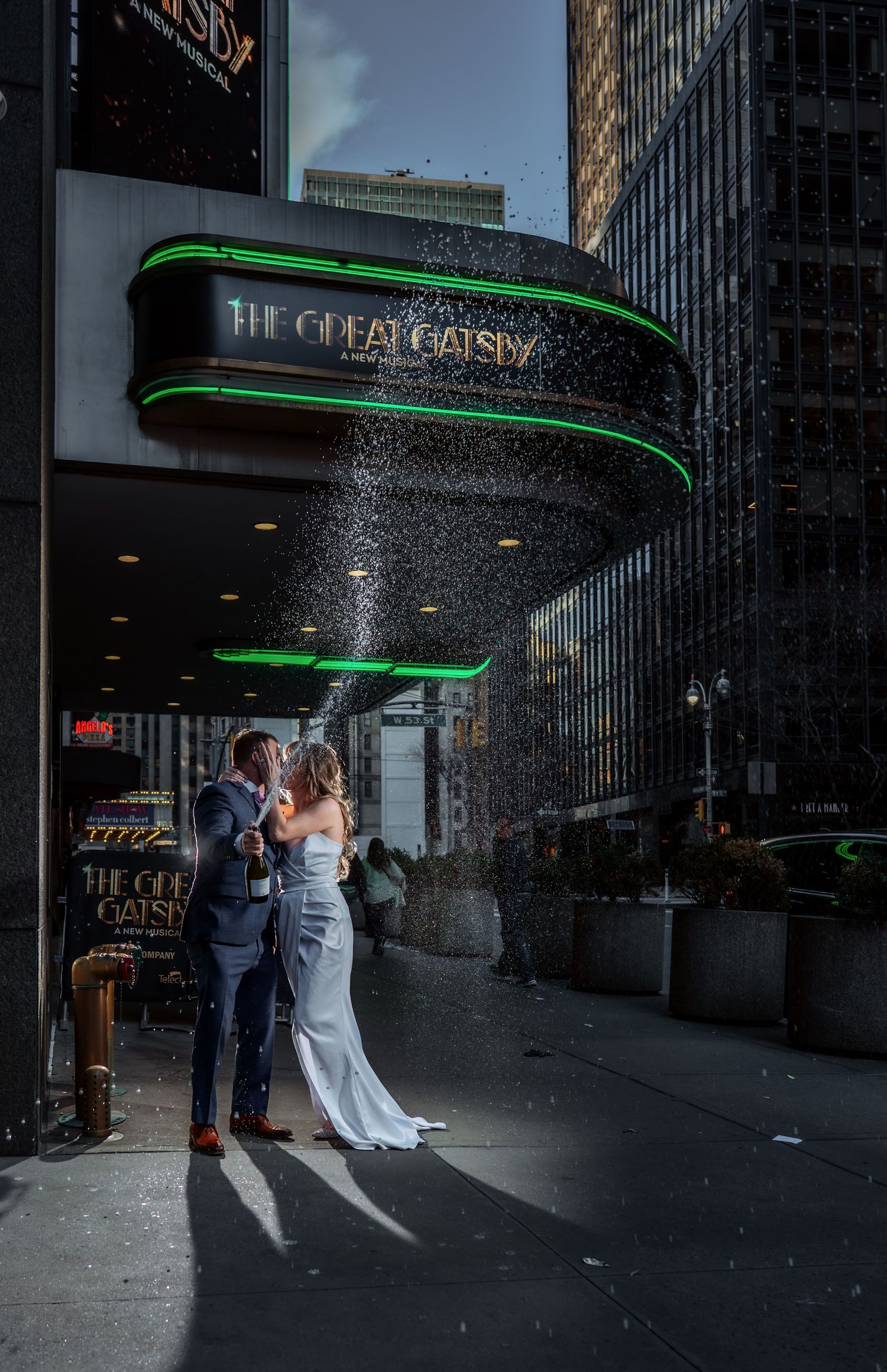 Dramatic urban wedding photo sequence with neon green lighting against modern city architecture.