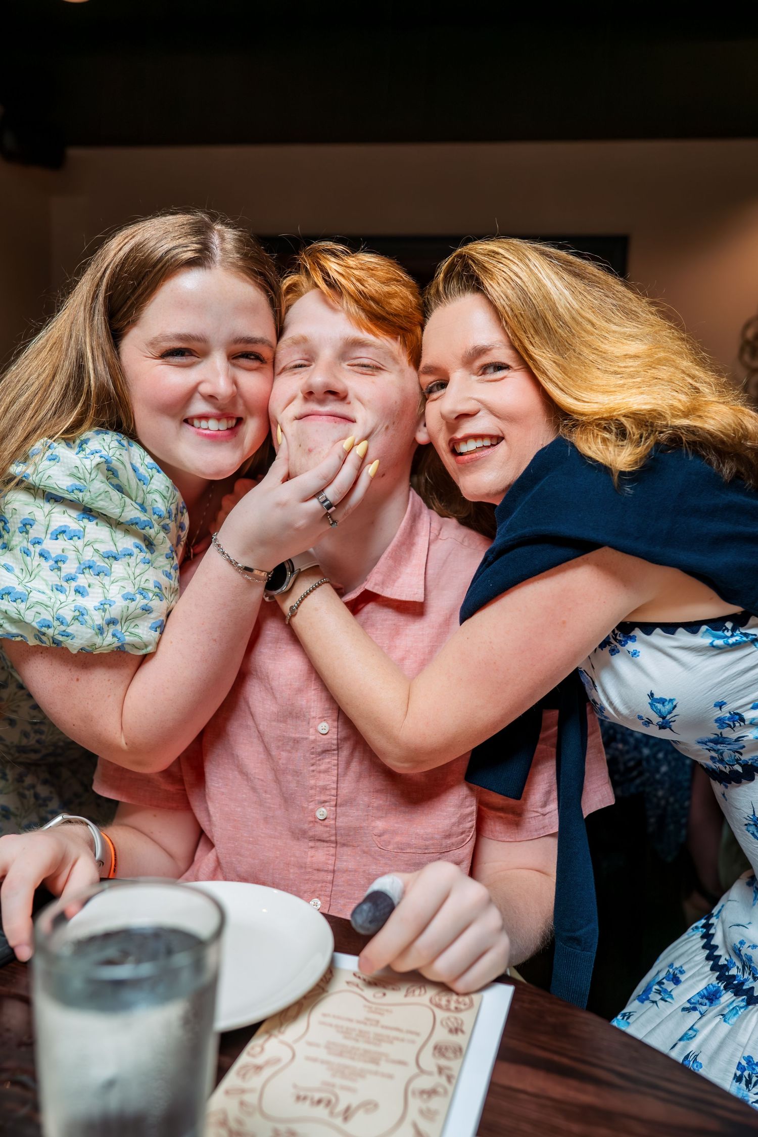 Candid reception photos showing joyful laughter and celebration.