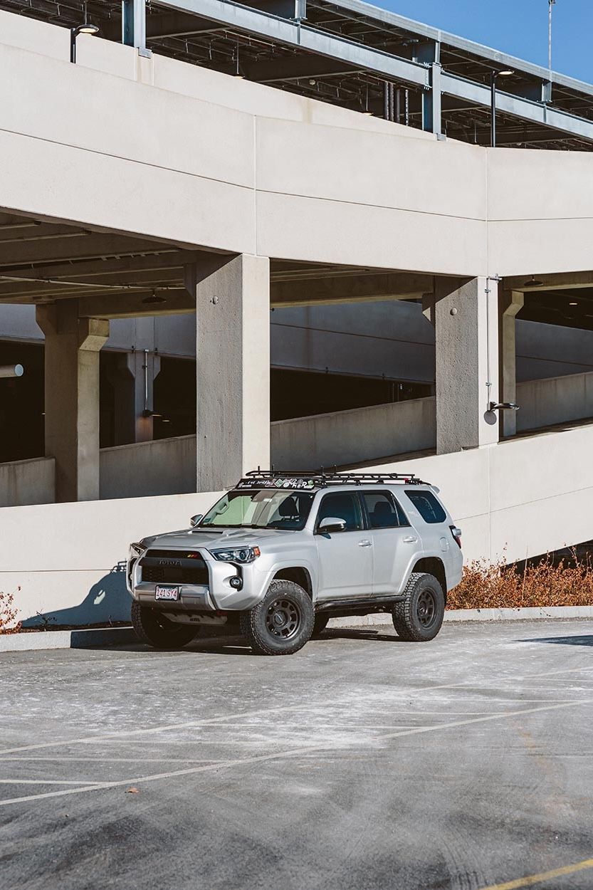 Boston automotive photography of Toyota 4Runner set in urban parking lot environment.