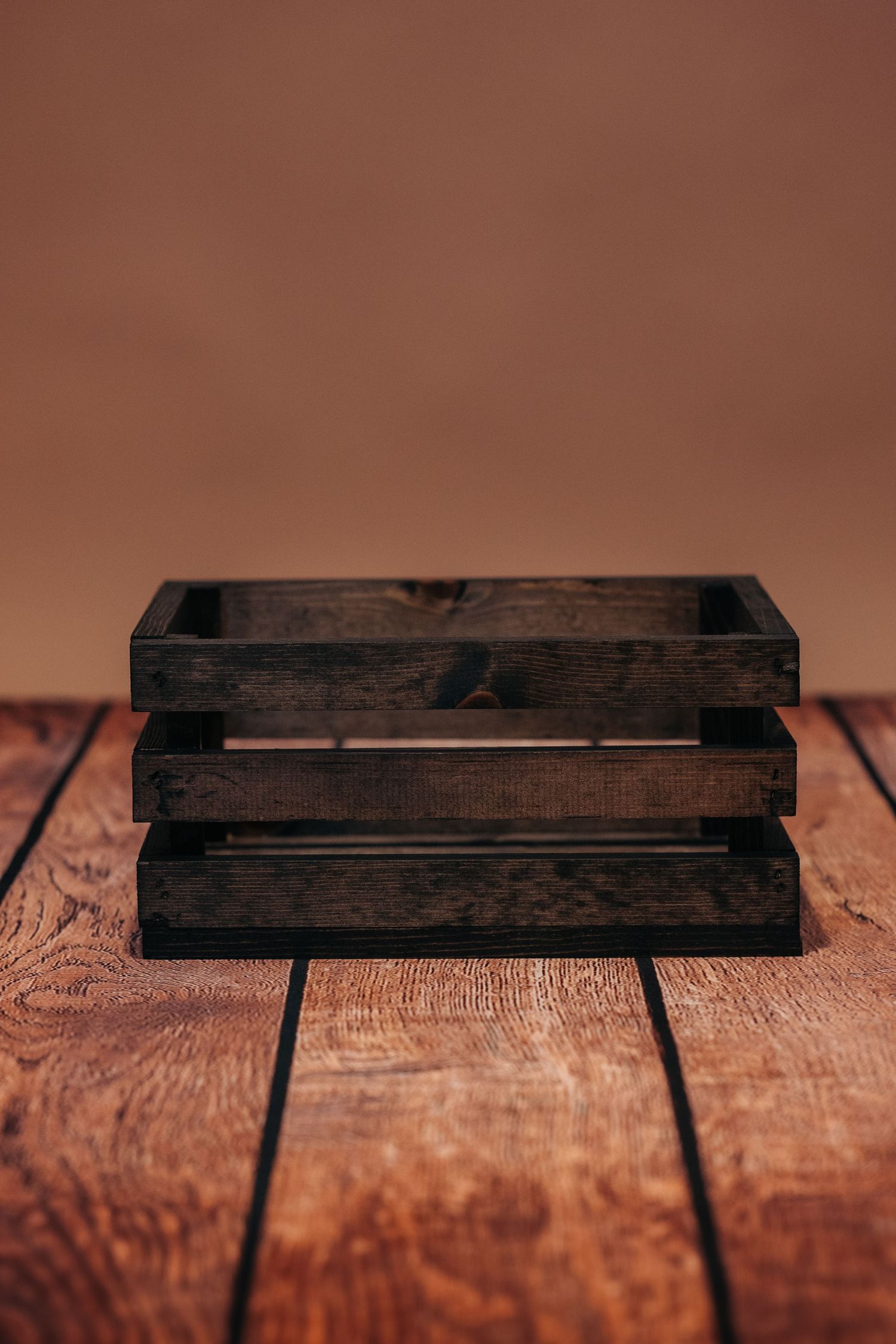 Dark wood crate newborn prop.