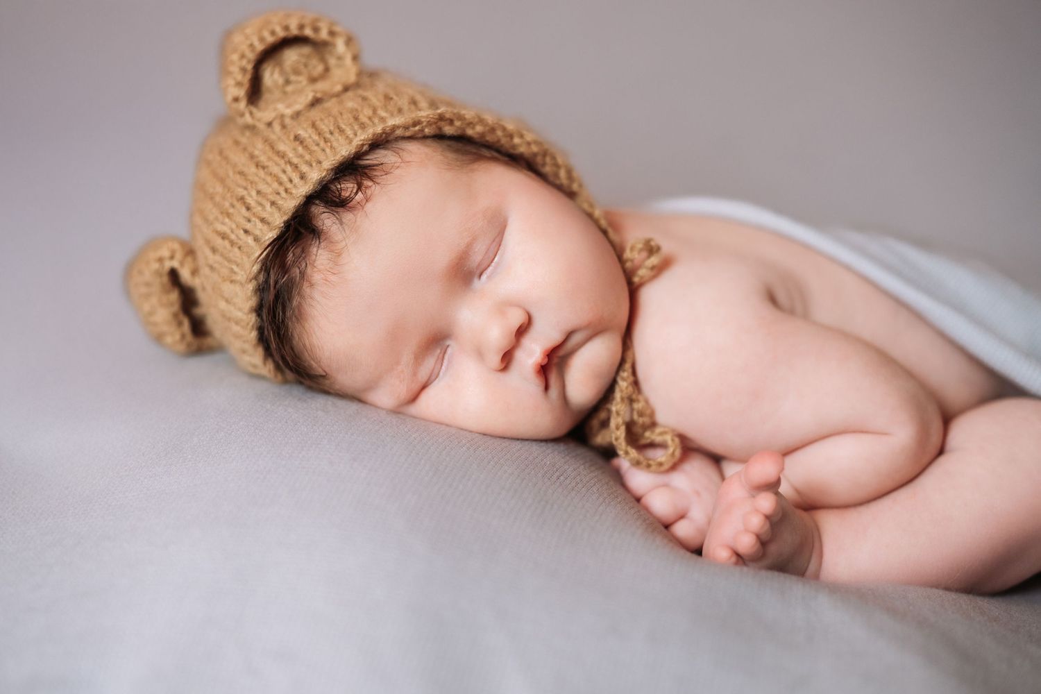 Sleeping bear newborn photography.
