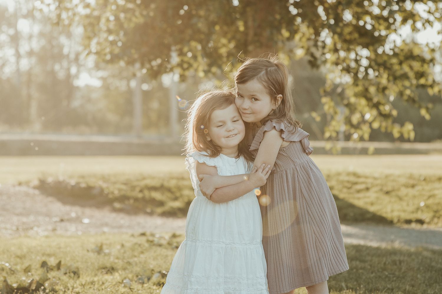 Family-group-hug-with-kids-smiling-during-a-Spokane-portrait-session