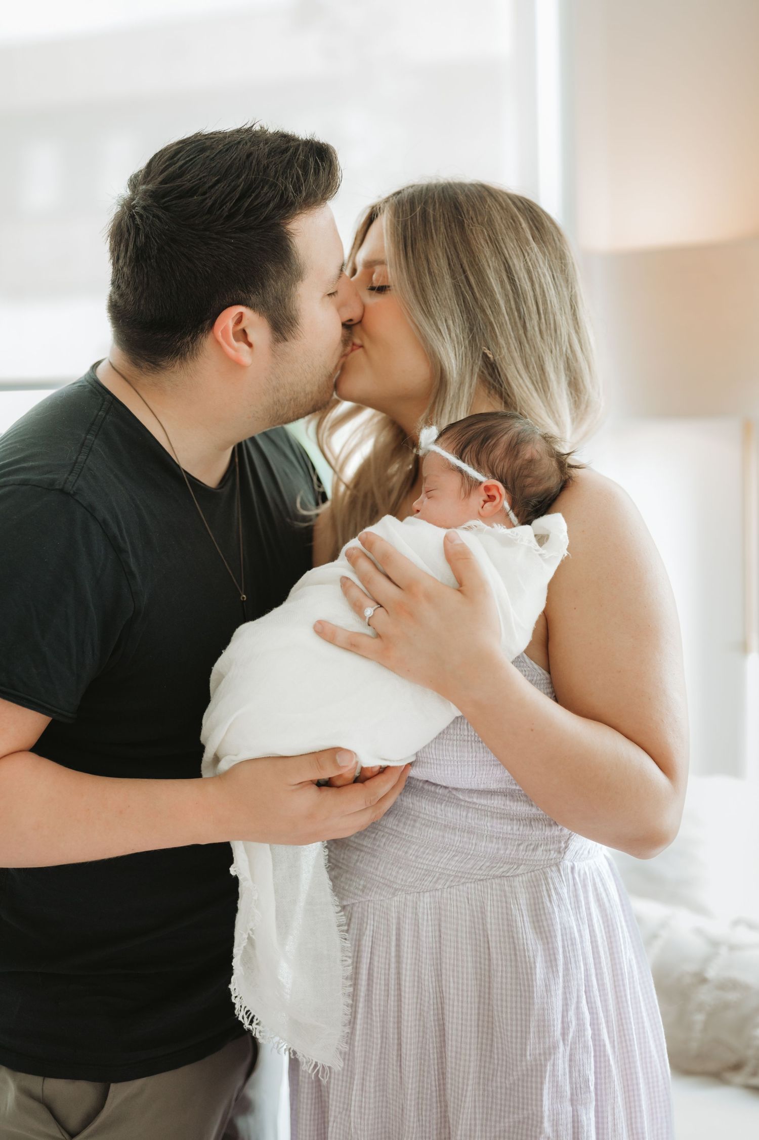 In-home lifestyle newborn family photography session