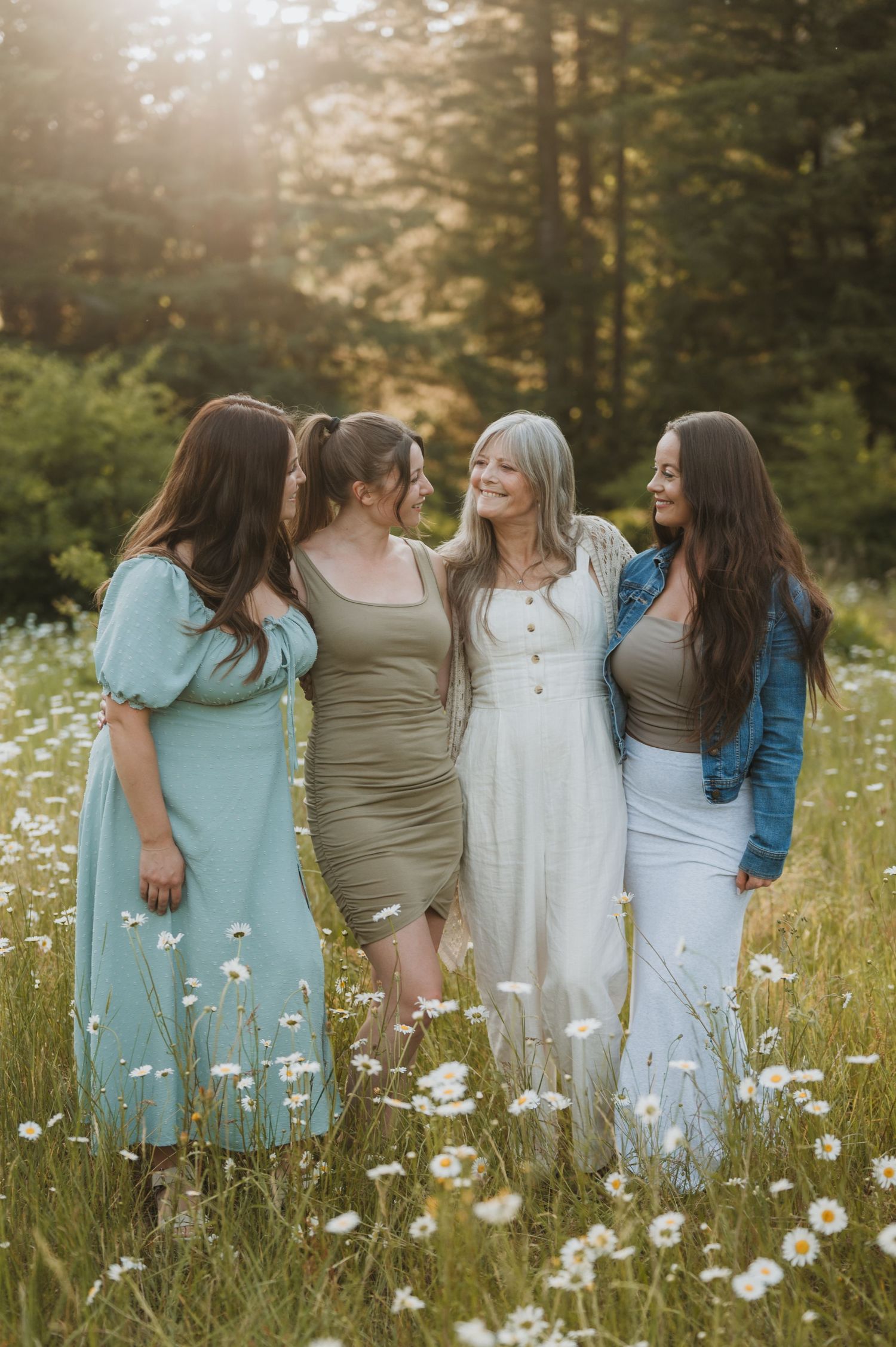 Family extended family session, mother and daughters in the wildflowers