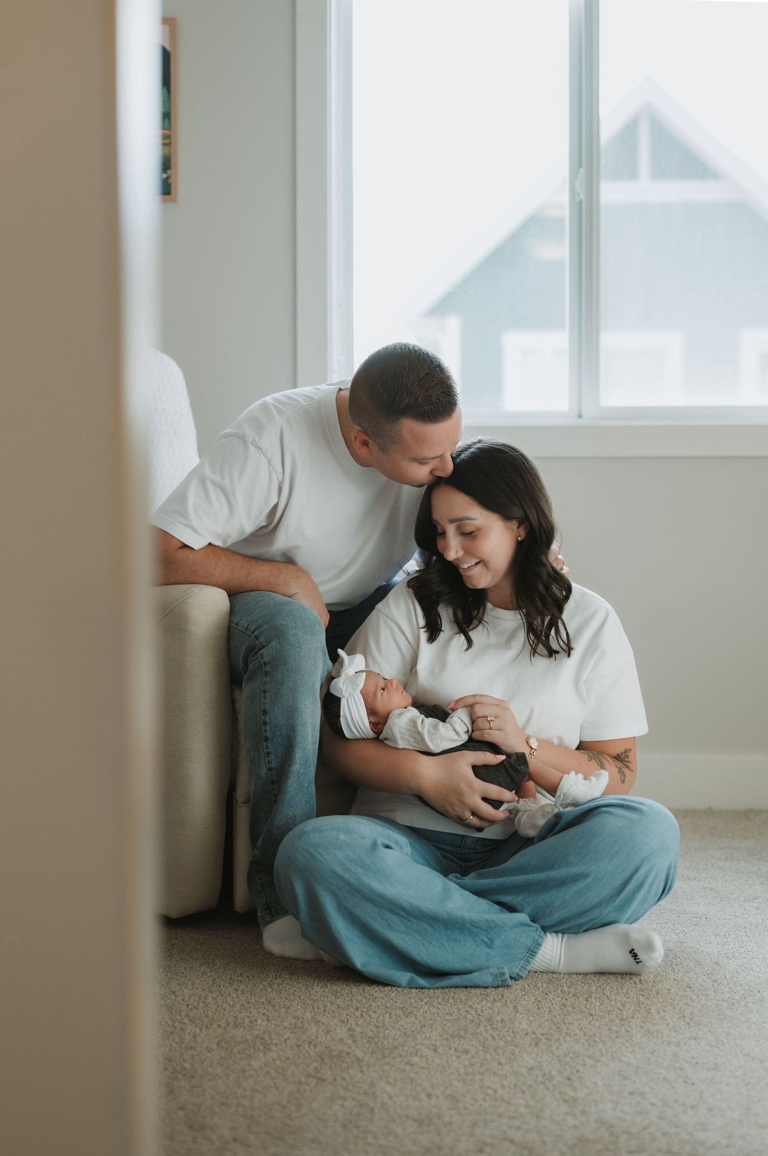 In-home lifestyle newborn family photography session