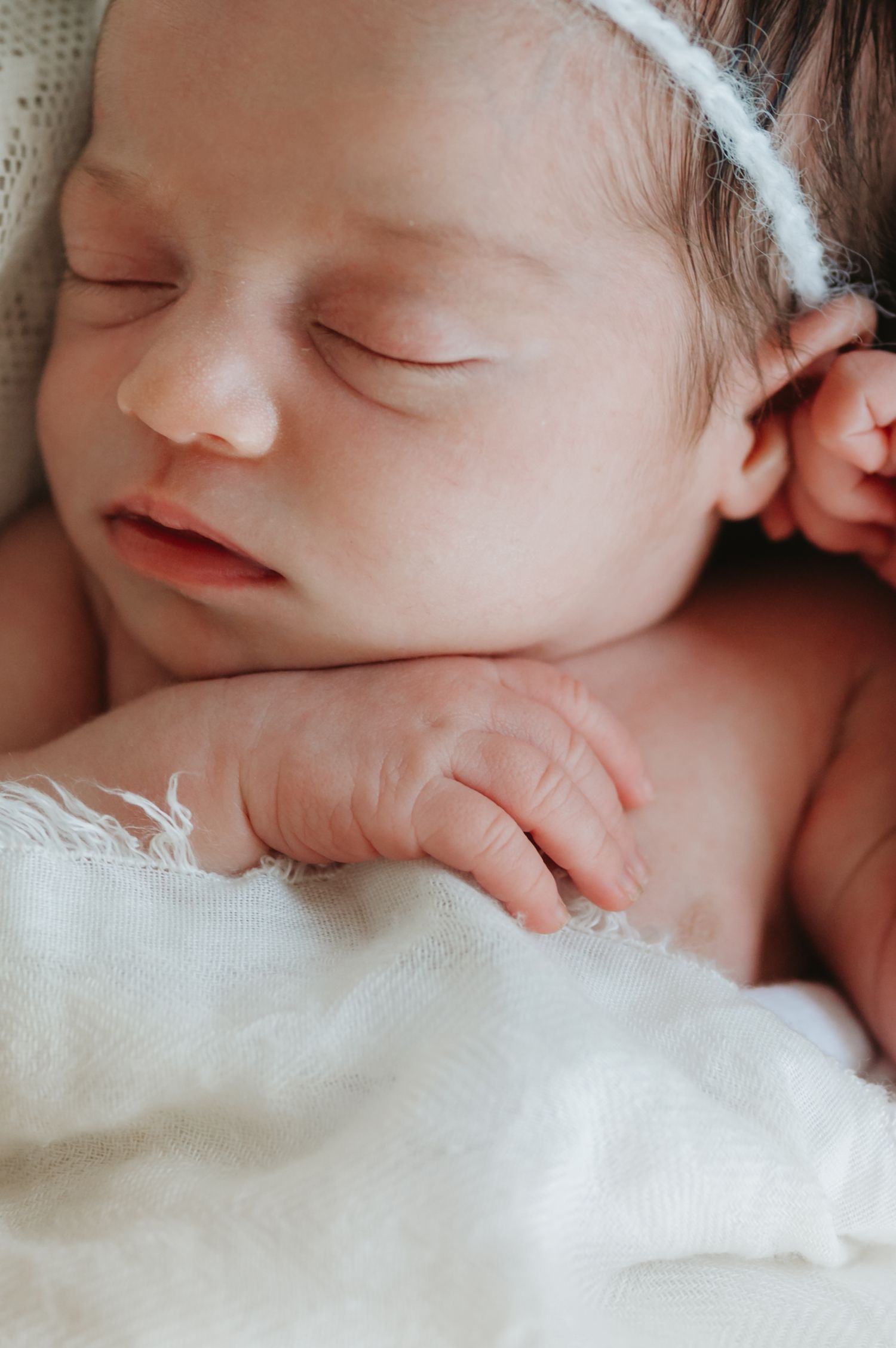 In-home lifestyle newborn family photography session, newborn close-up