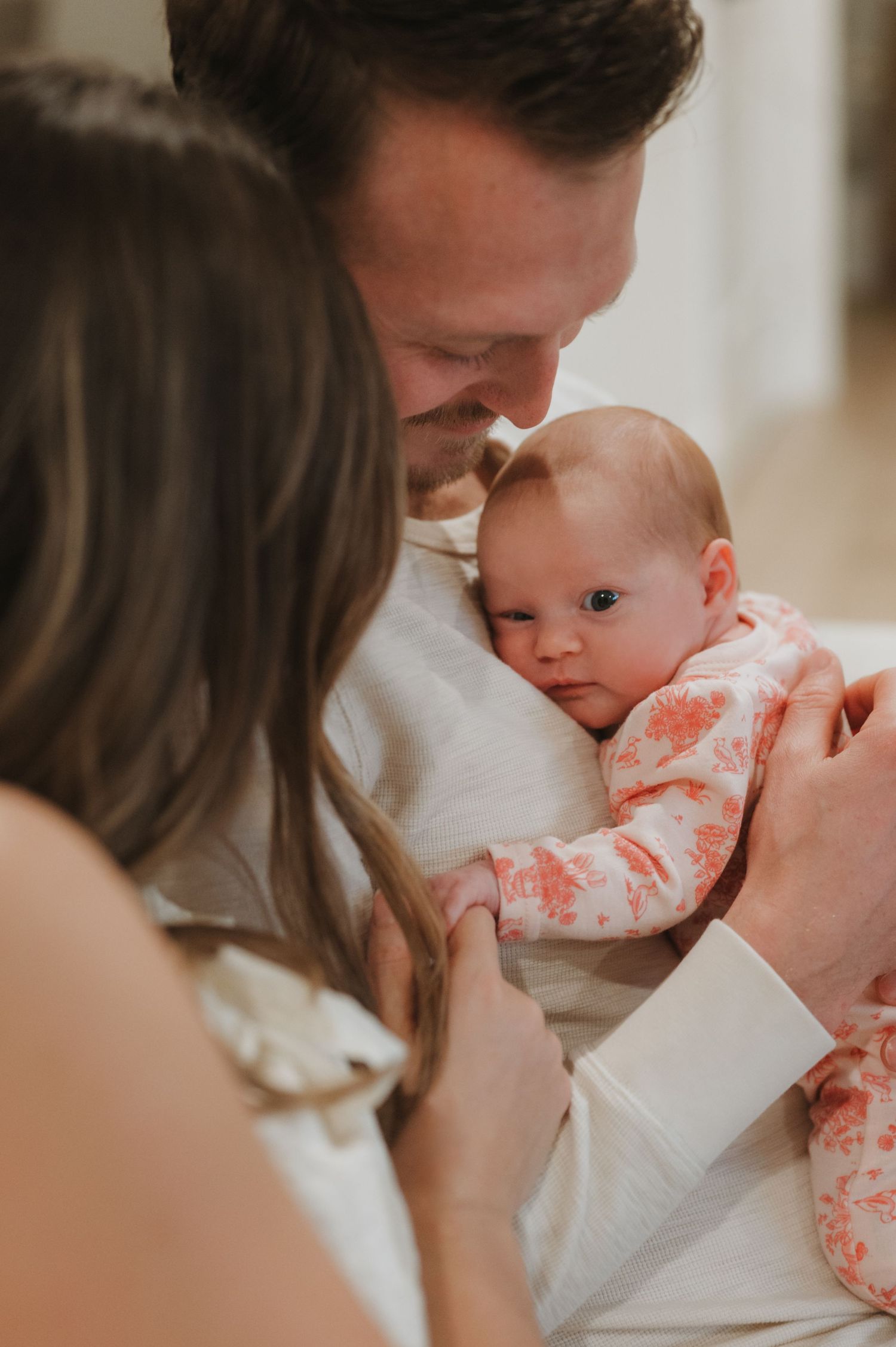 In-home lifestyle newborn family photography session