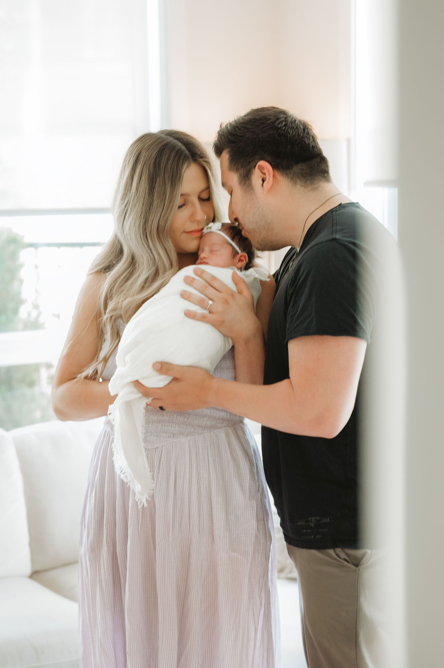 In-home lifestyle newborn family photography session