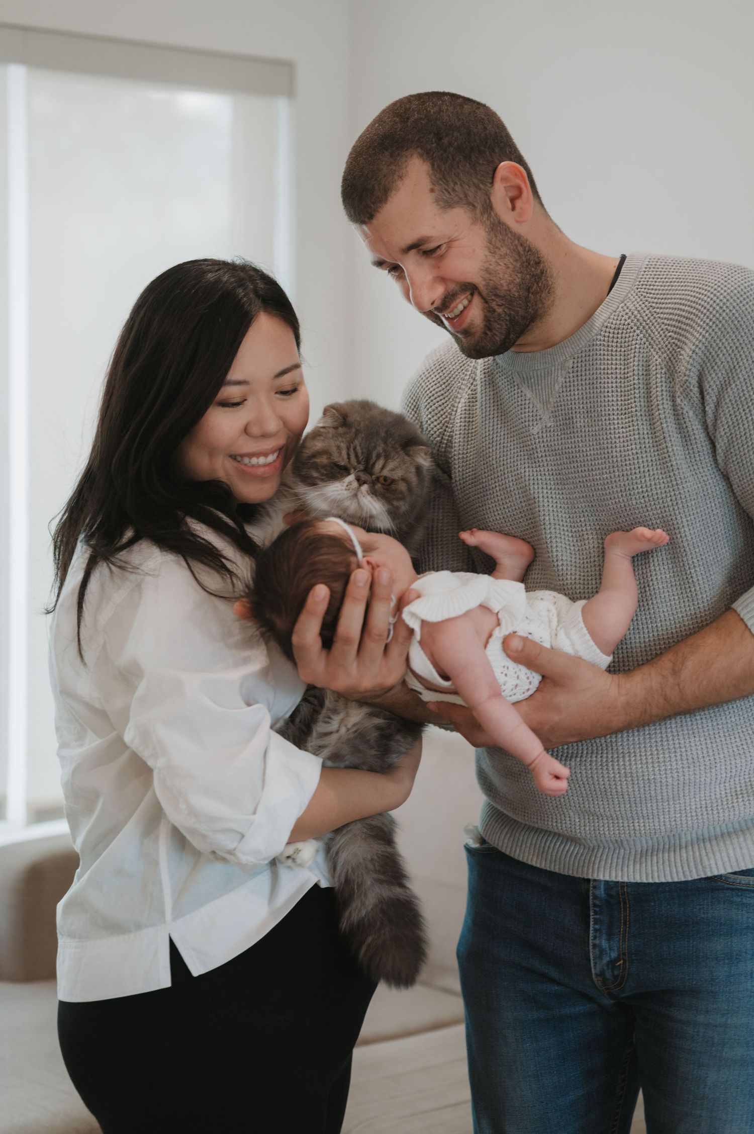 In-home lifestyle newborn family photography session