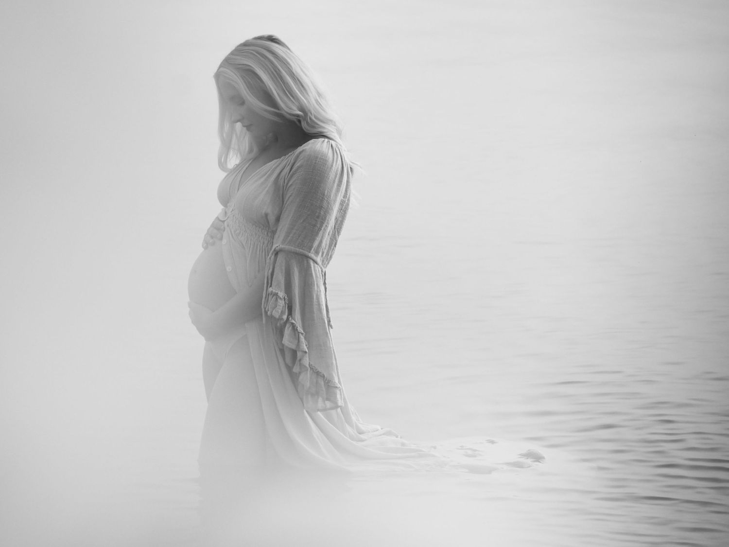 A calm moment for a maternity pose.