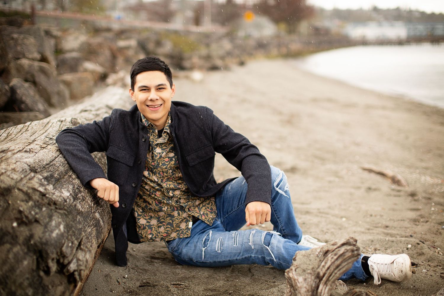 Senior portrait session featuring casual poses on a rustic outdoor path at sunset.