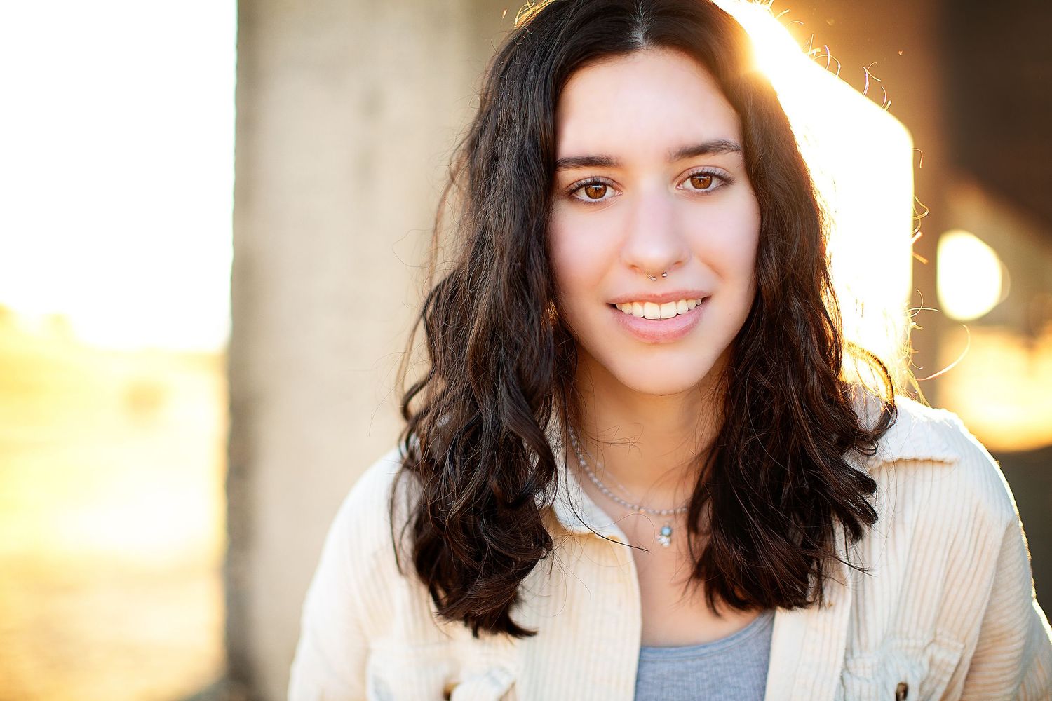 Portrait series with dramatic backlighting creating warm golden glow effects.