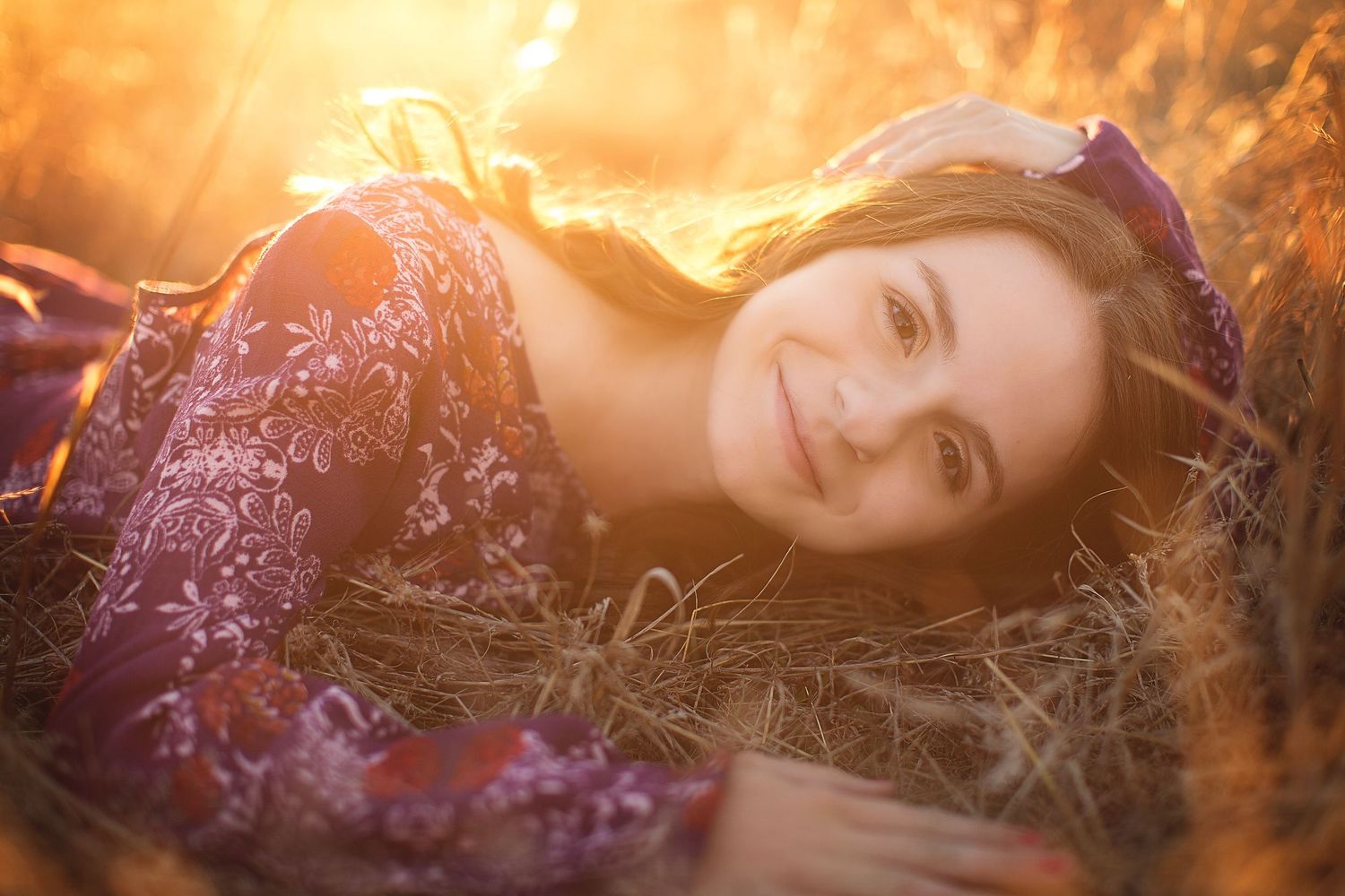 Artistic portrait series with warm autumn lighting and floral elements.