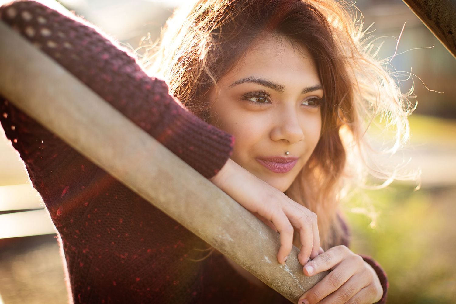 Romantic autumn portraits with soft backlighting and cozy sweaters.