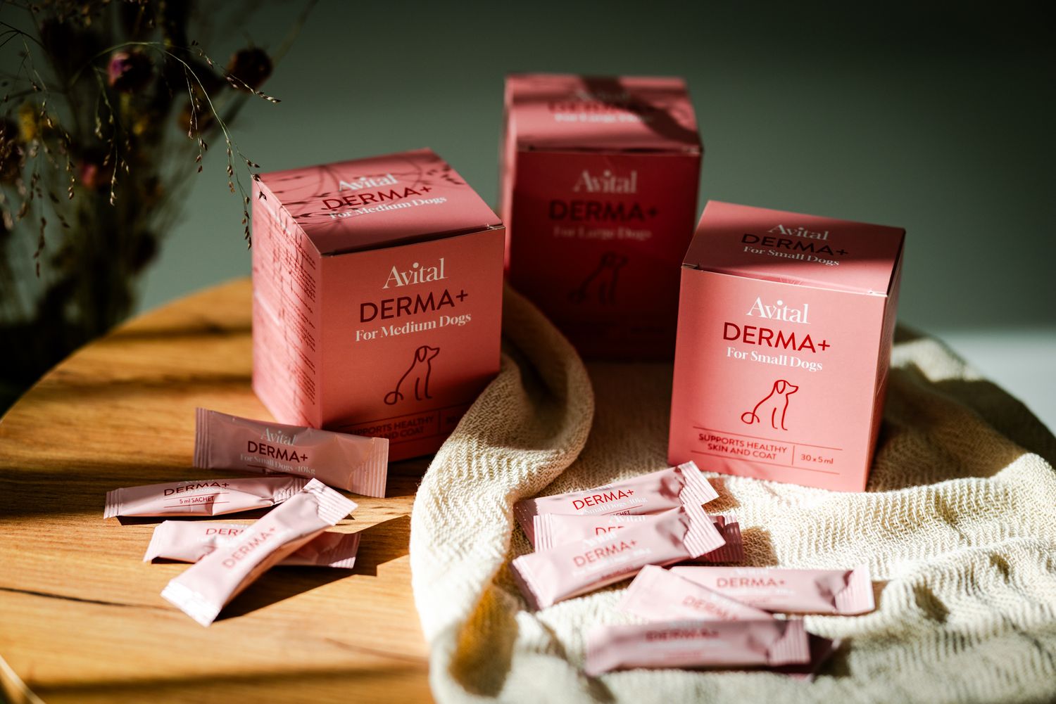 Asetelma Avital Derma+ tuotteita