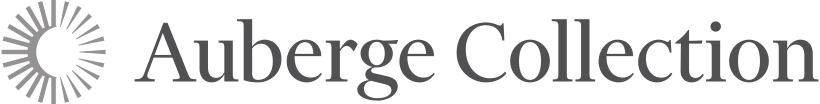 Auberge Collection luxury hospitality brand logo featuring a sunburst icon and elegant gray serif typography.