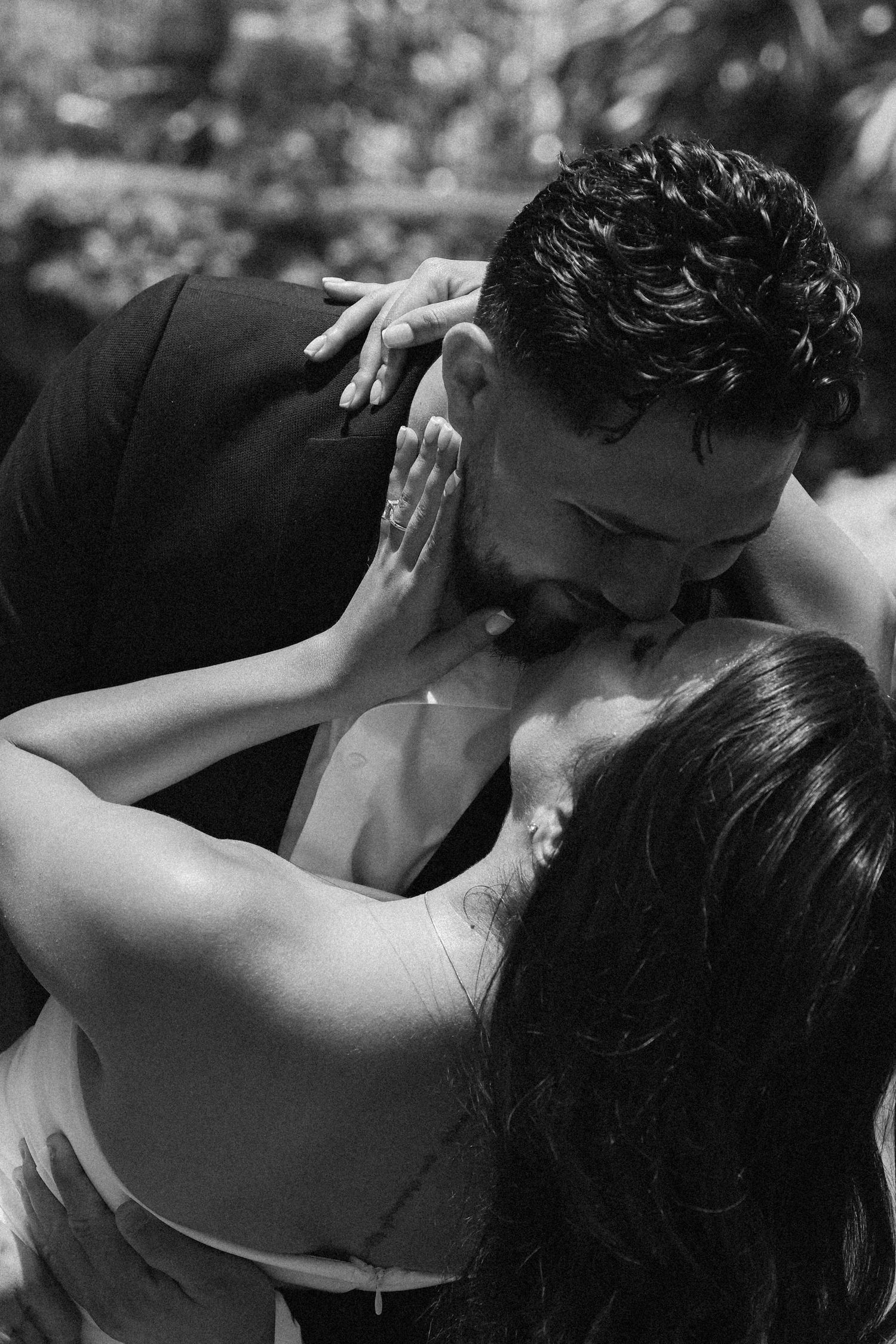 A romantic black and white sequence showing an intimate moment between a couple.