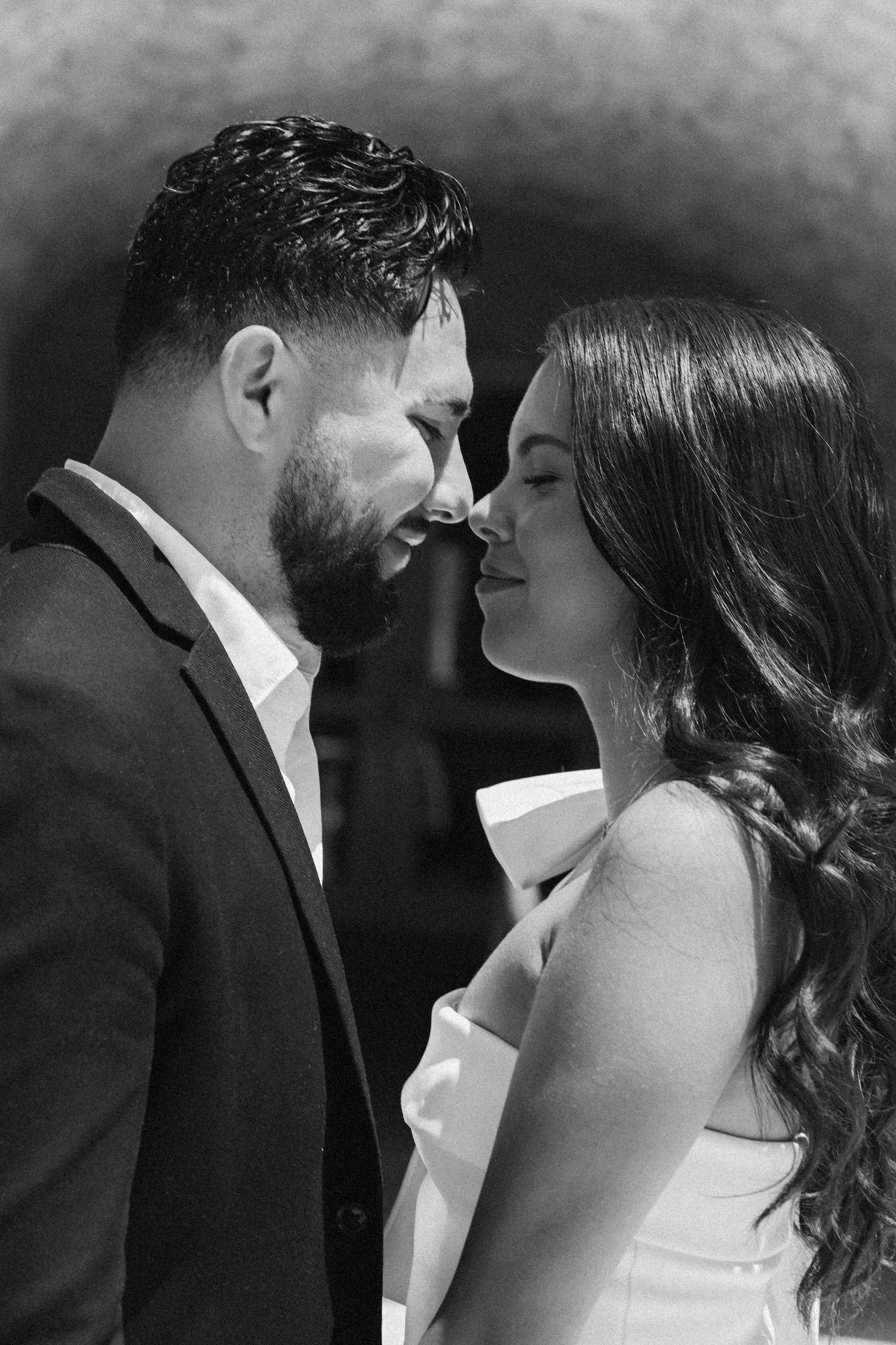 Black and white photo series capturing intimate moments between a couple.