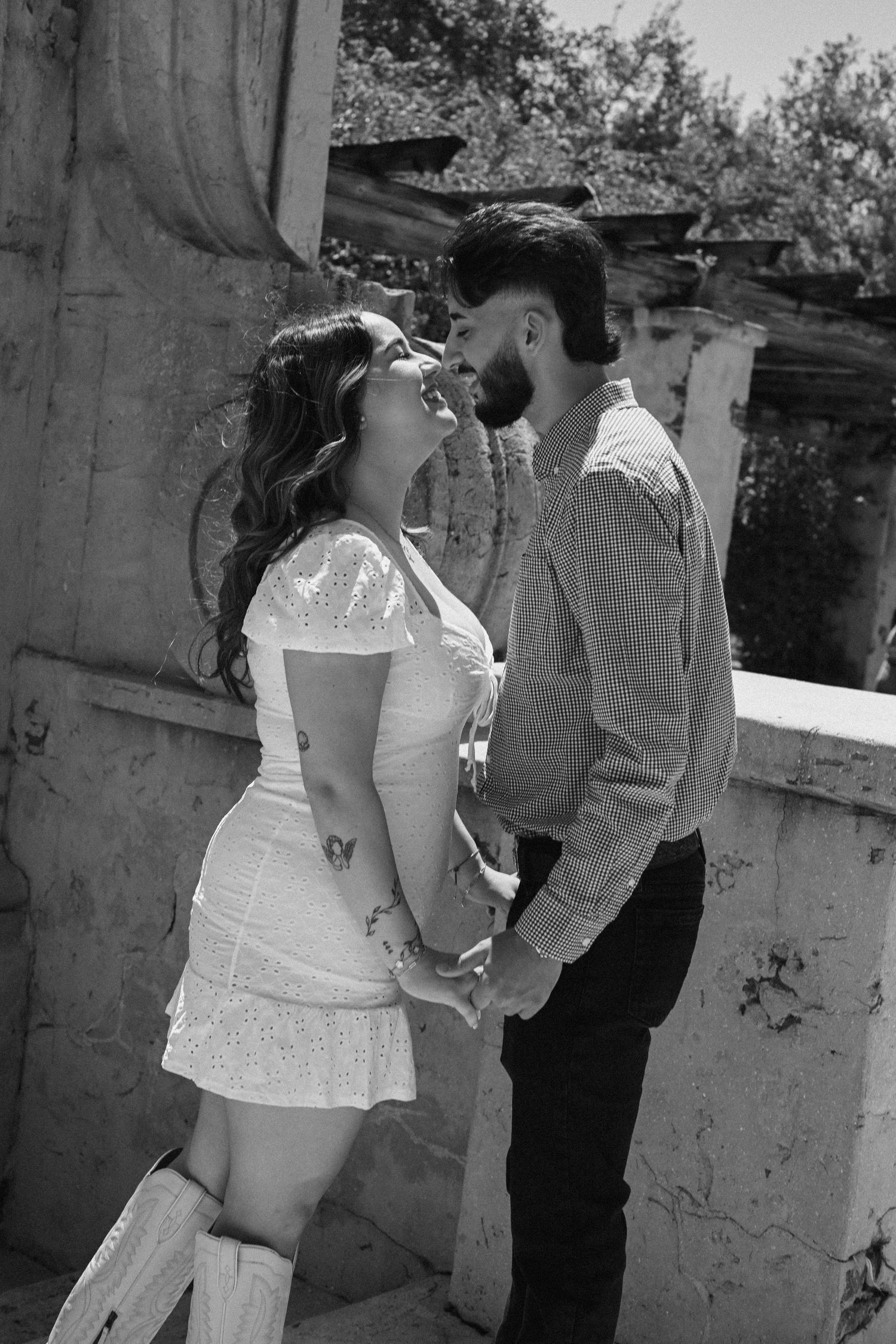 A series of candid moments captured against a stone wall backdrop.