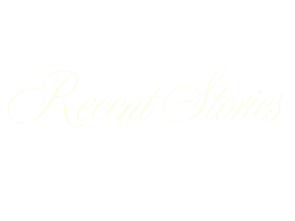 Elegant cursive script logo in cream white color on a white background.