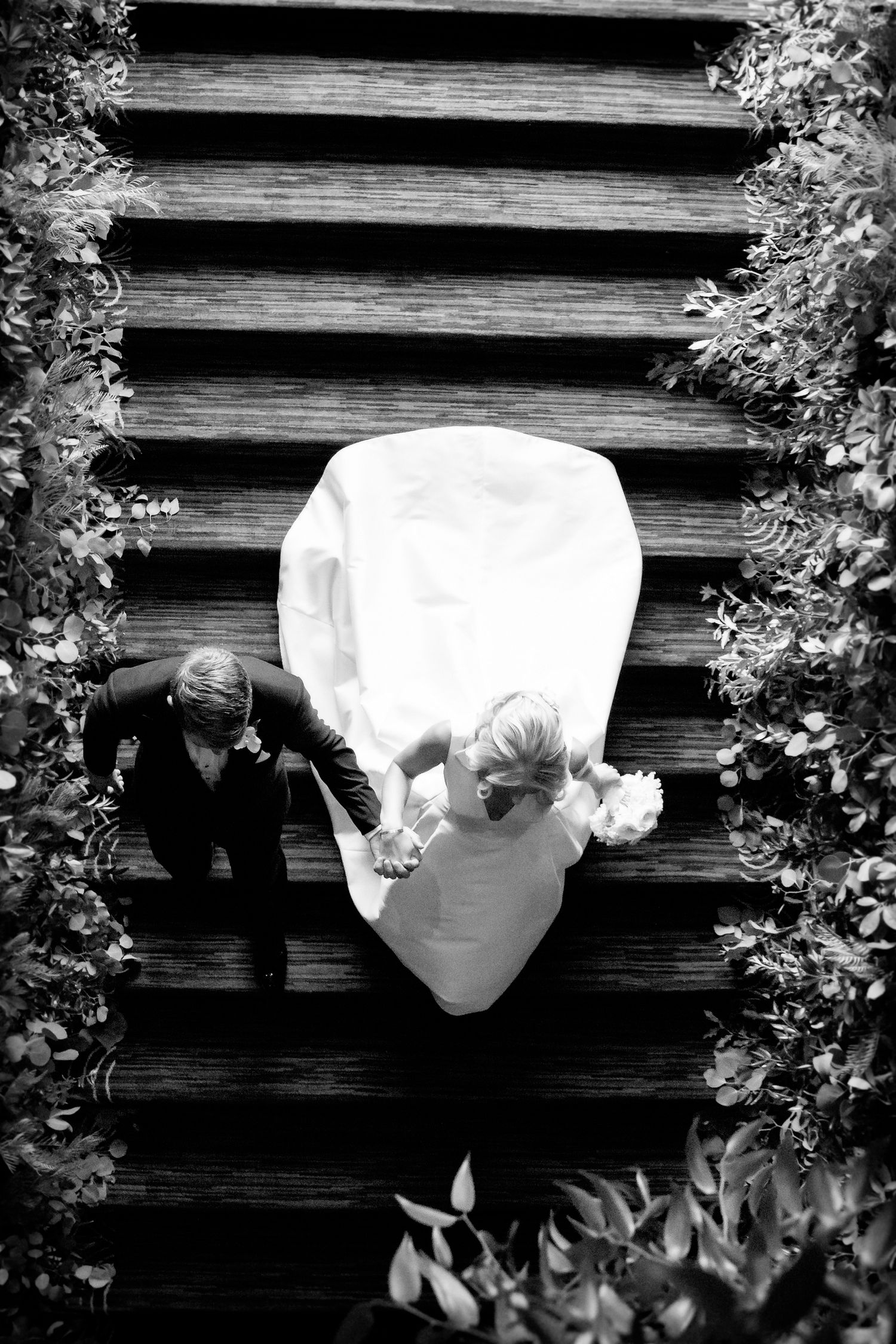 Wedding Photos on the staircase at the Four Seasons Hotel Boston