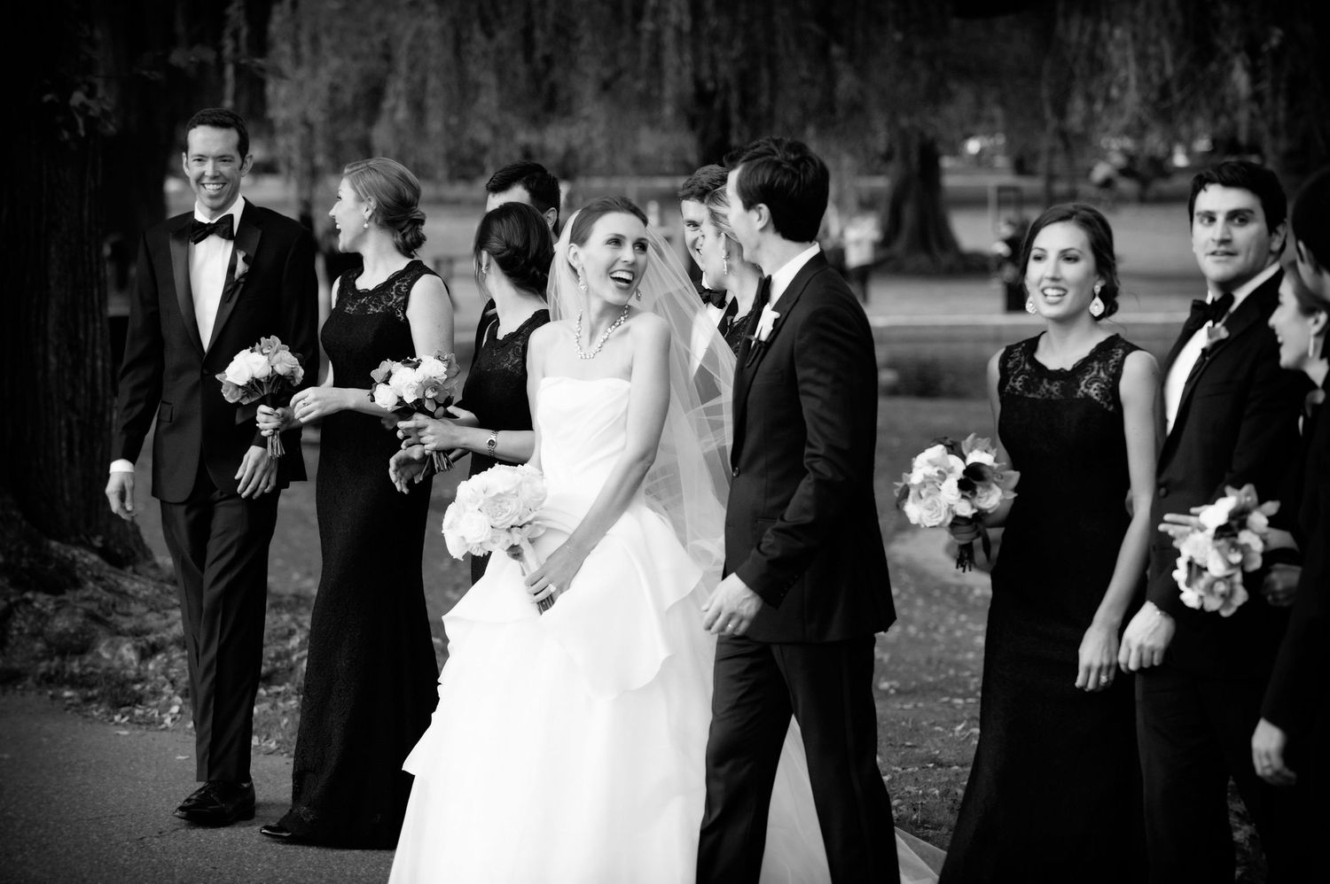 A collection of black and white wedding photos showing candid moments during a celebration Boston