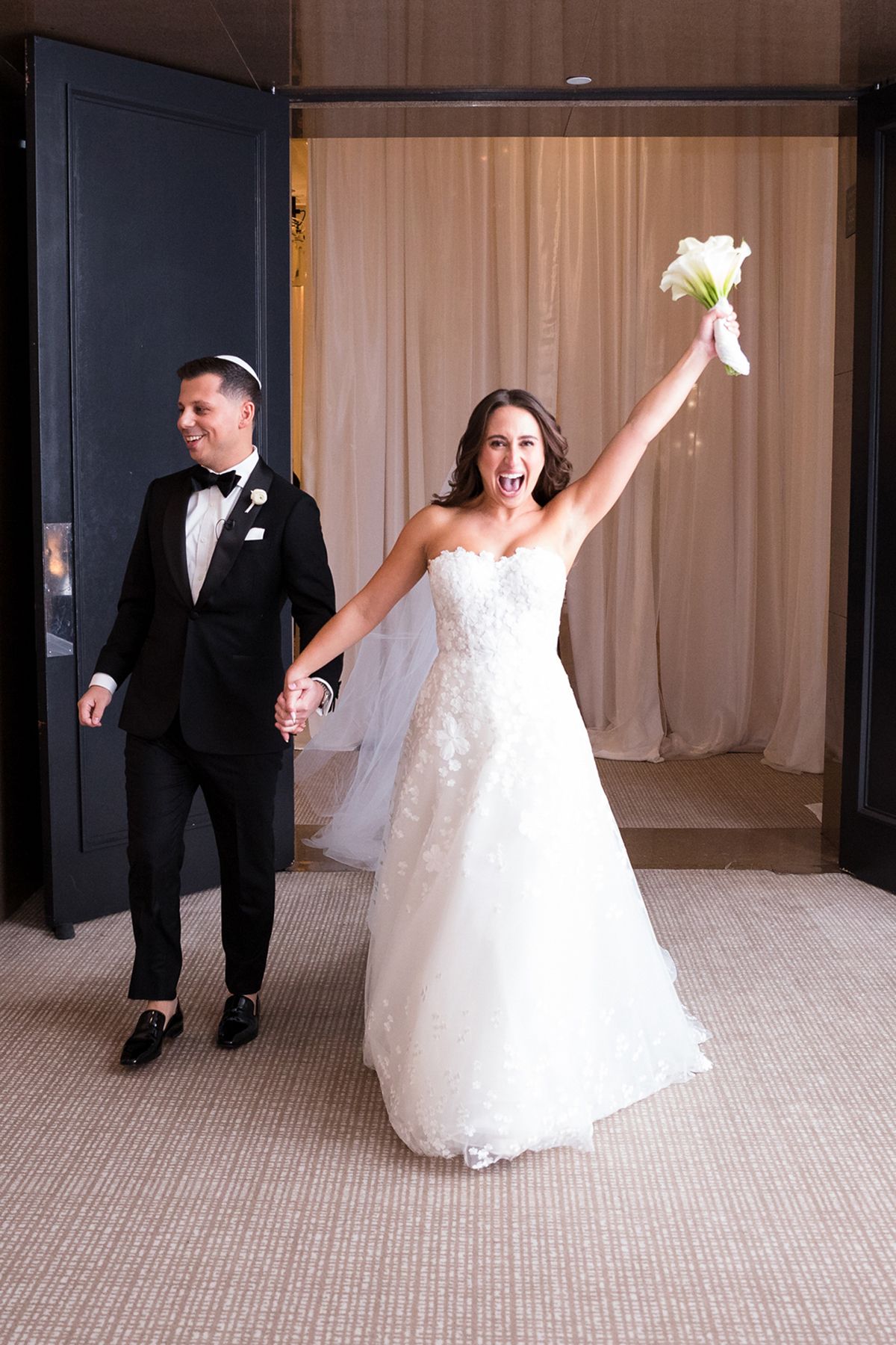 Wedding celebration at the Mandarin Oriental Boston. Photographed by Boston Wedding Photographer, Lauren Killian.