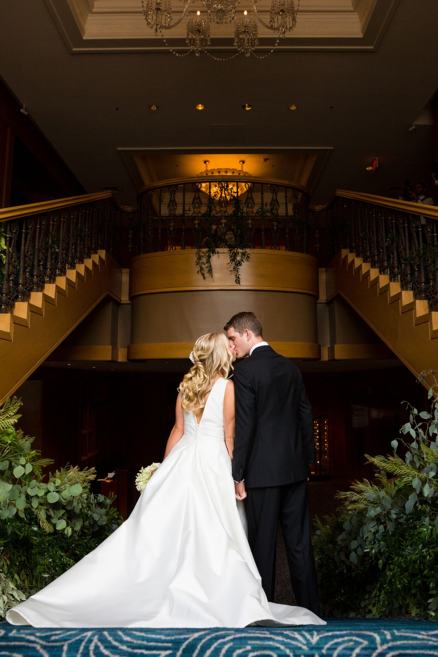 Wedding Photos on the staircase at the Four Seasons Hotel Boston