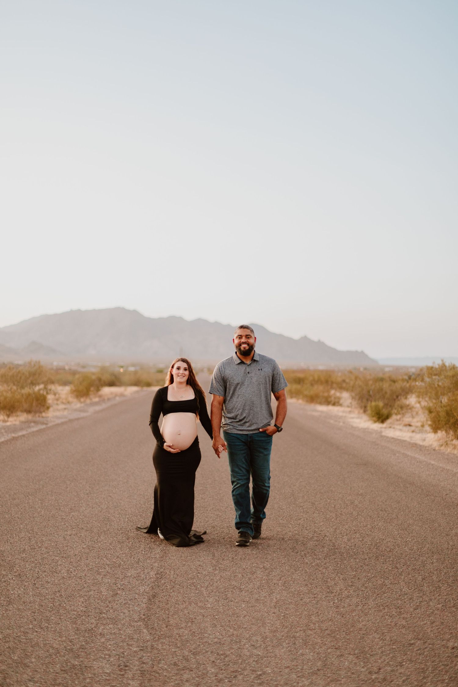 Outdoor maternity photo shoot near Phoenix with cactus and Mountain Views - Arizona Desert Mountain Sunset