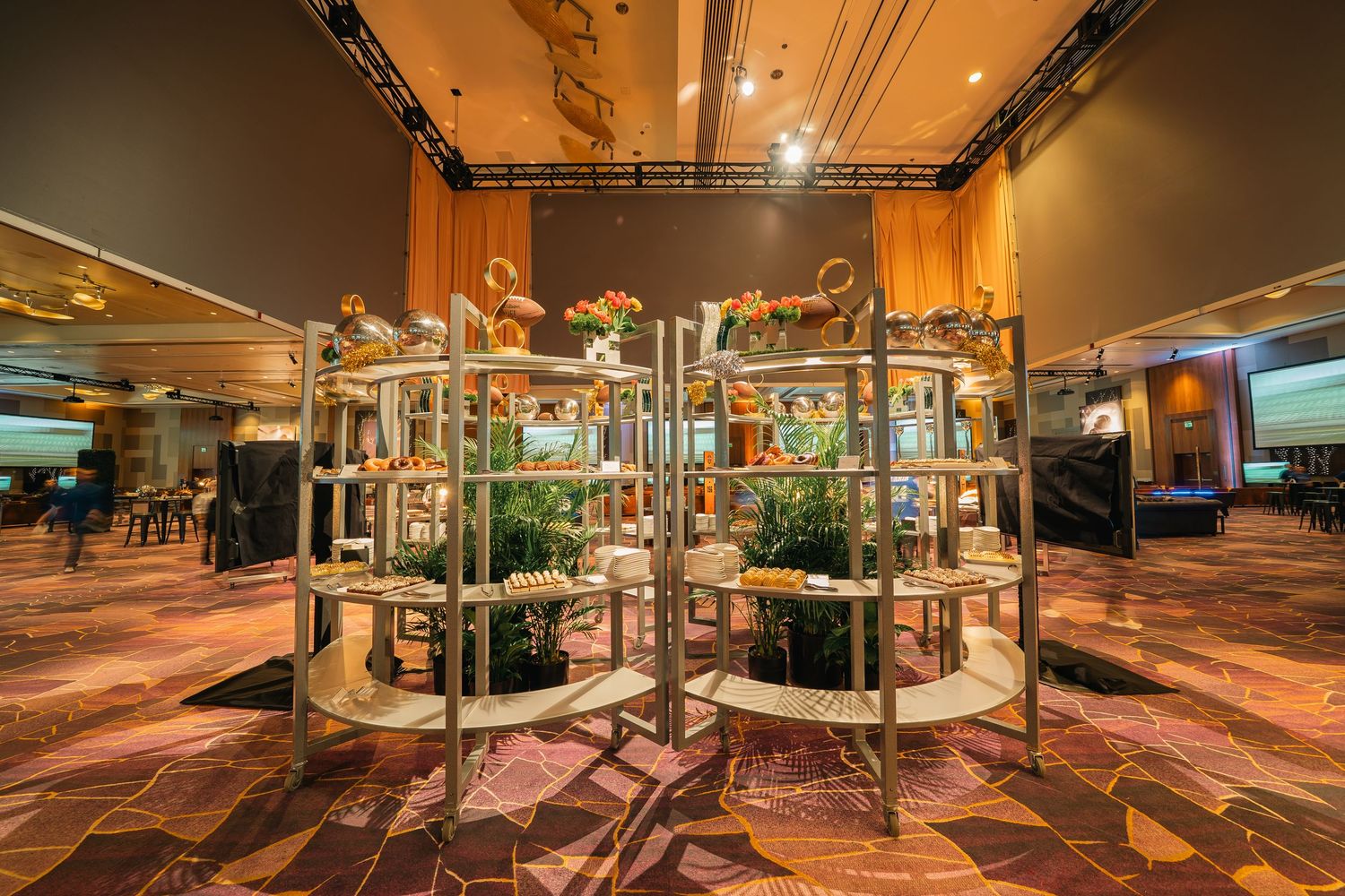 Casino entertainment area with modern seating and ambient lighting creating a luxurious atmosphere.