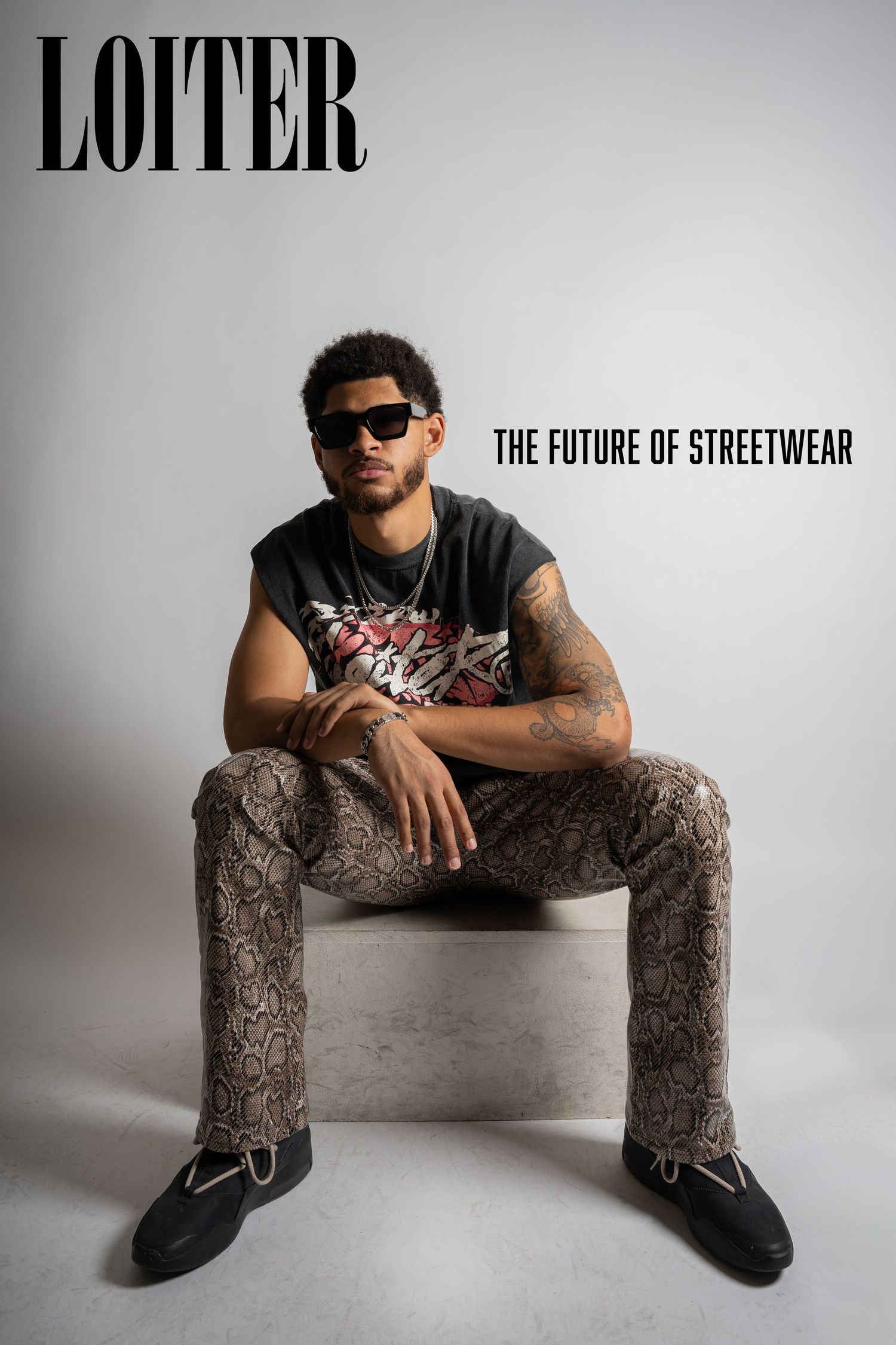 Urban fashion magazine cover featuring LOITER branding and streetwear style.