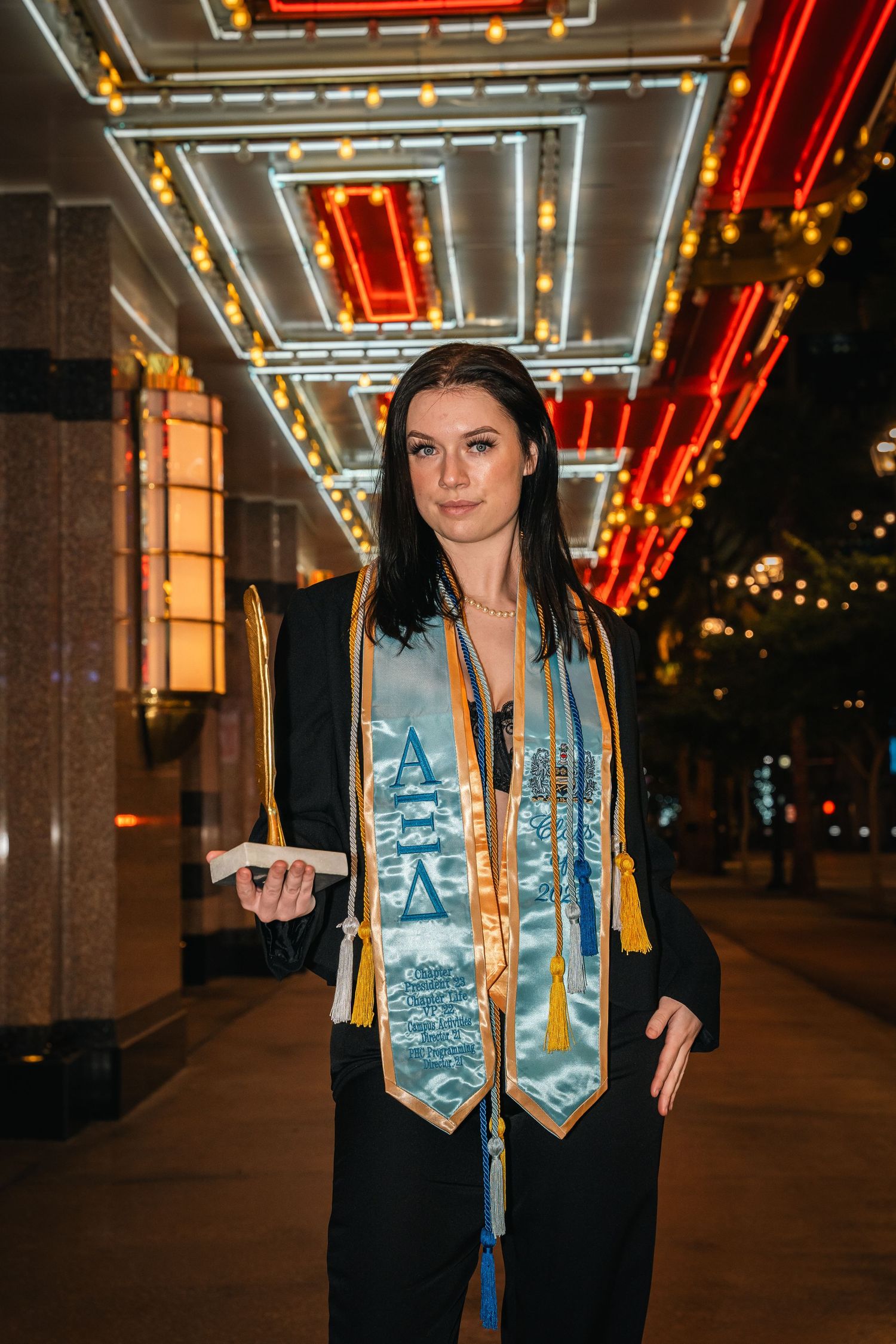 Night graduation photos with illuminated columns and special stoles.