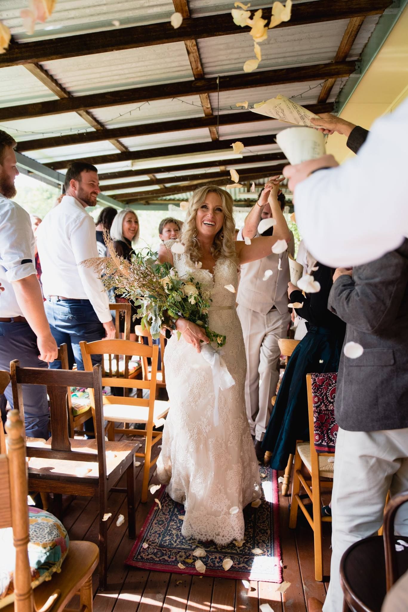 Image of bride walking down the isle, taken by ballarat wedding photographer Lucy Alexandra Images