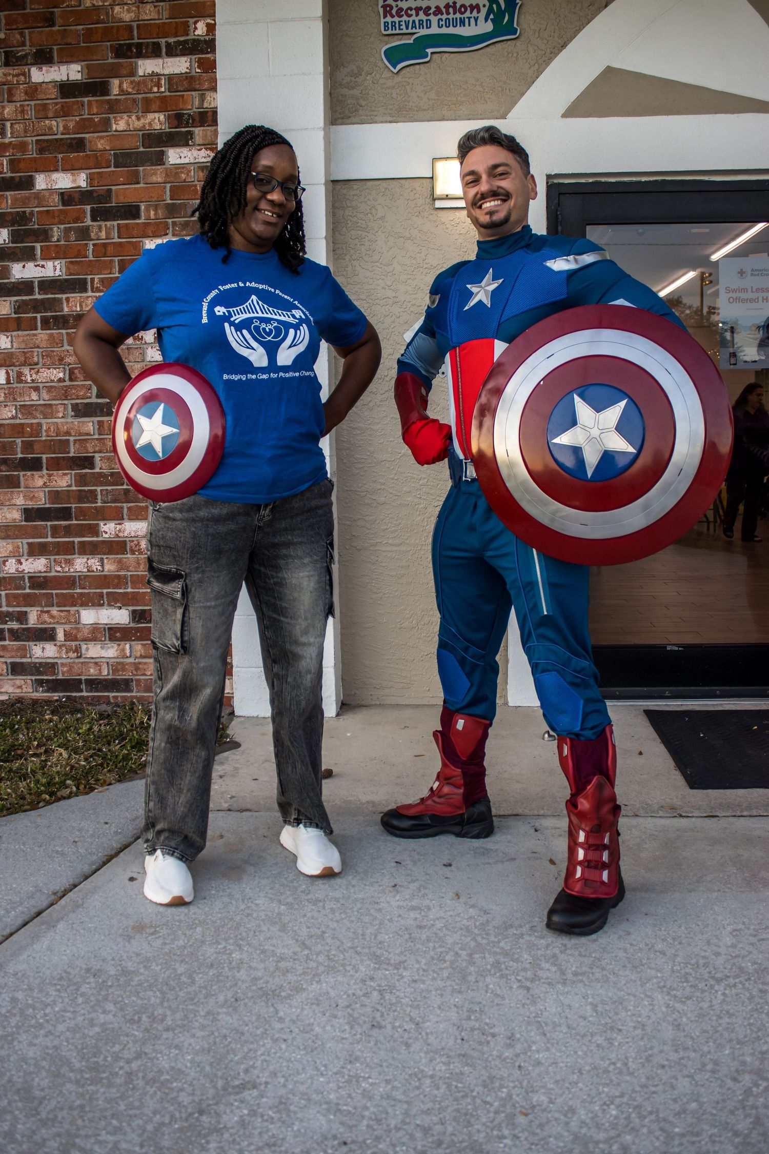 daniel harris captain america poses with teacher