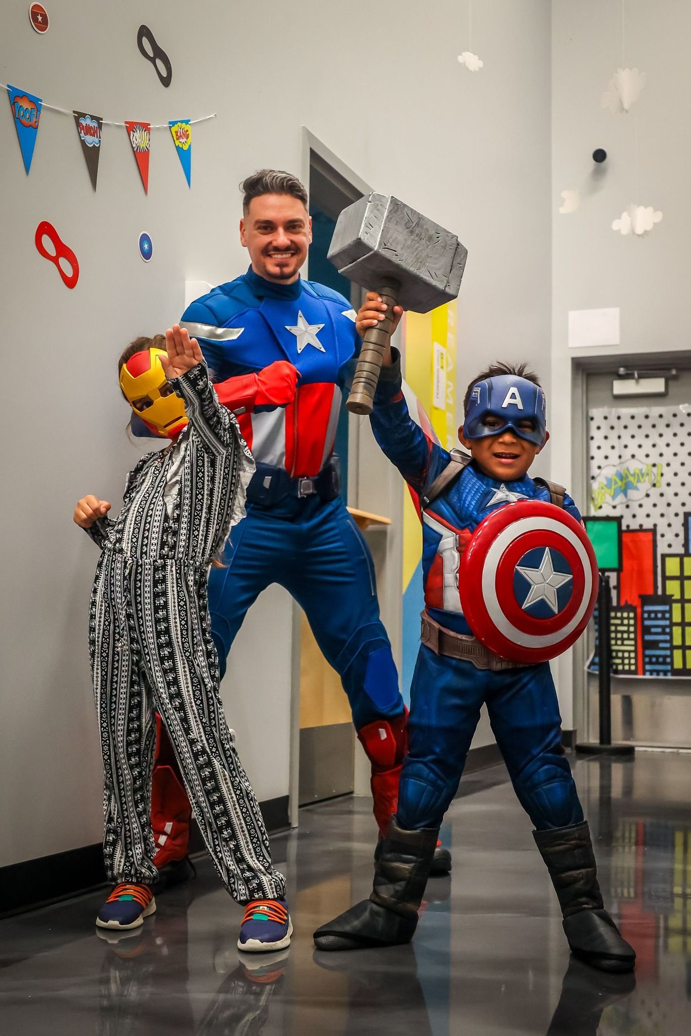 daniel and boy in costume as captain america