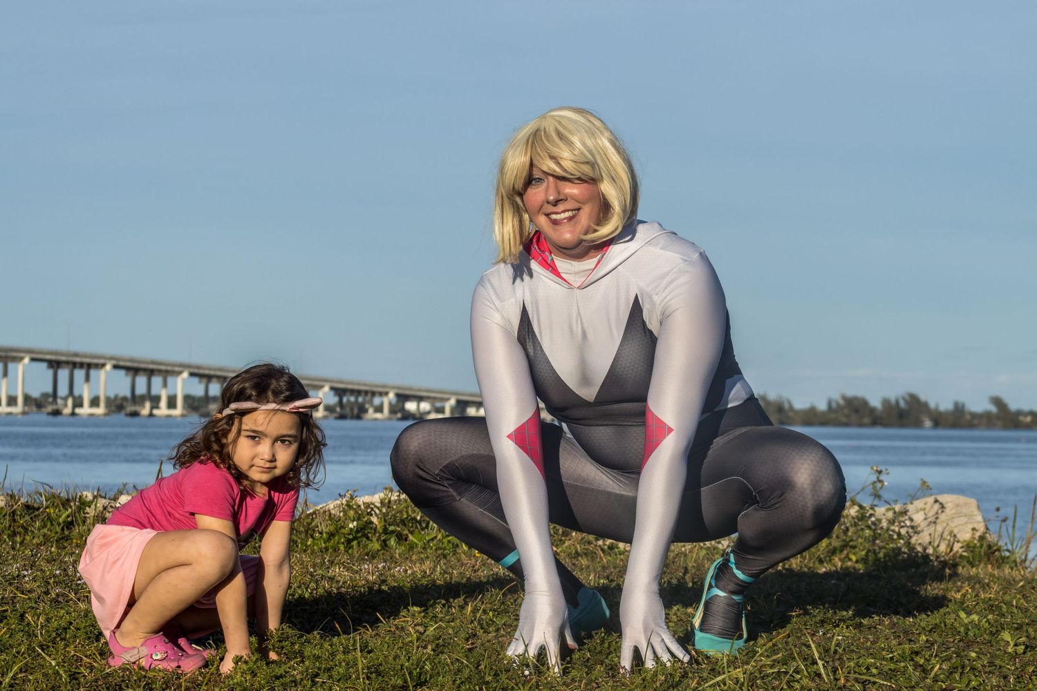 spider-gwen posing with girl