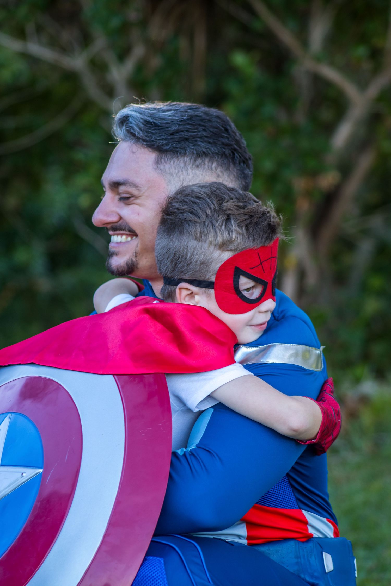 daniel harris hugging boy dressed up