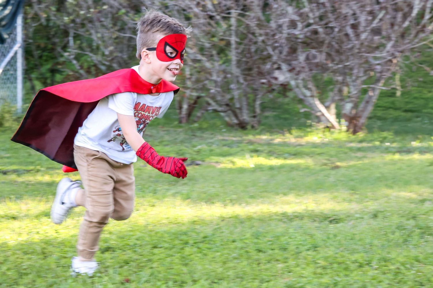 boy in costume running