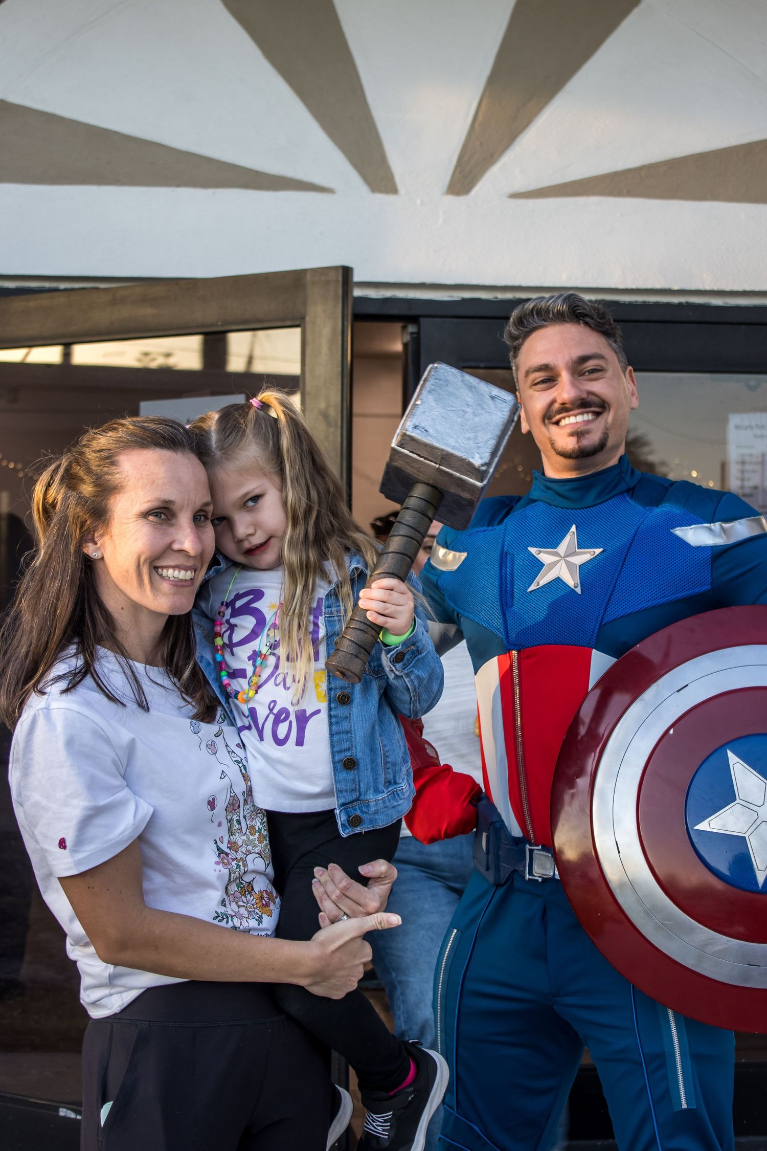 daniel harris captain america poses with family