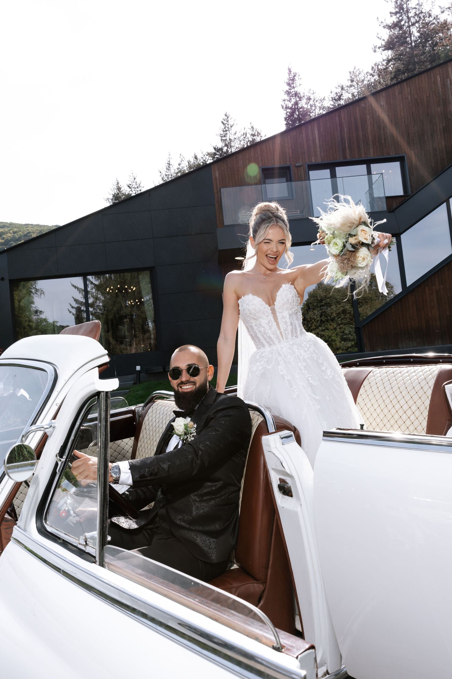 A sequence showing a person in a white wedding dress getting into a classic white car.