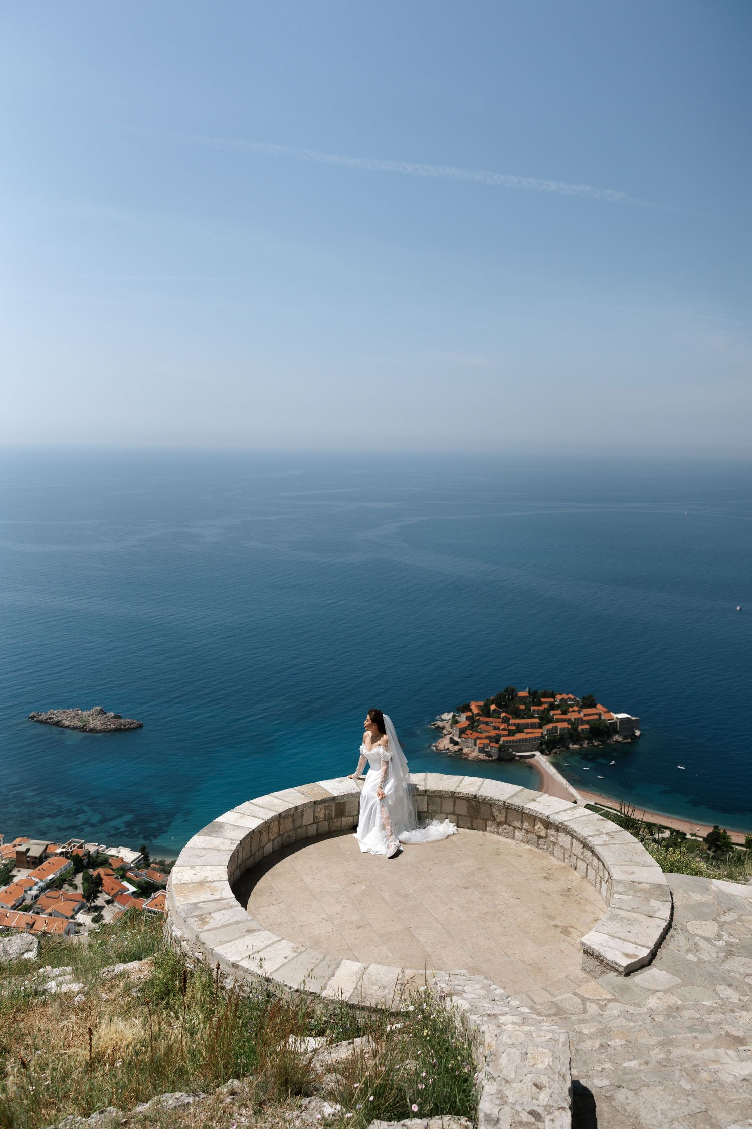 Panoramic coastal viewpoint overlooking blue Mediterranean waters and small islands near Dubrovnik, Croatia.
