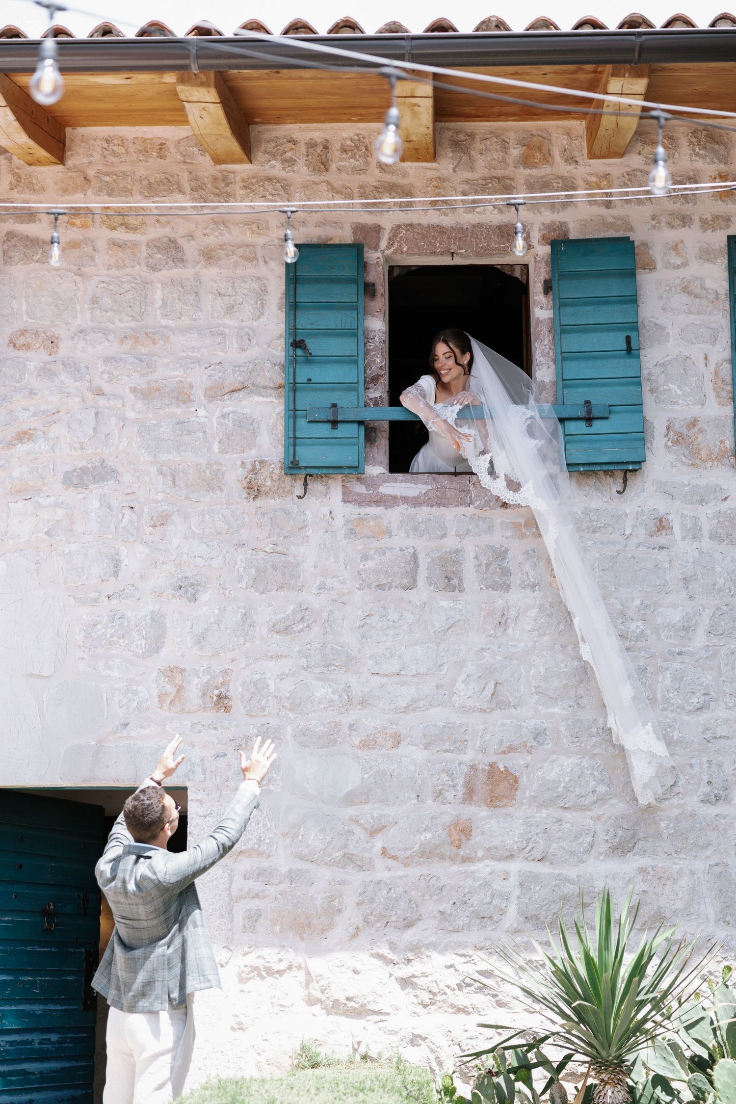 Three sequential photos showing someone climbing up a stone wall with teal shutters to reach a window.