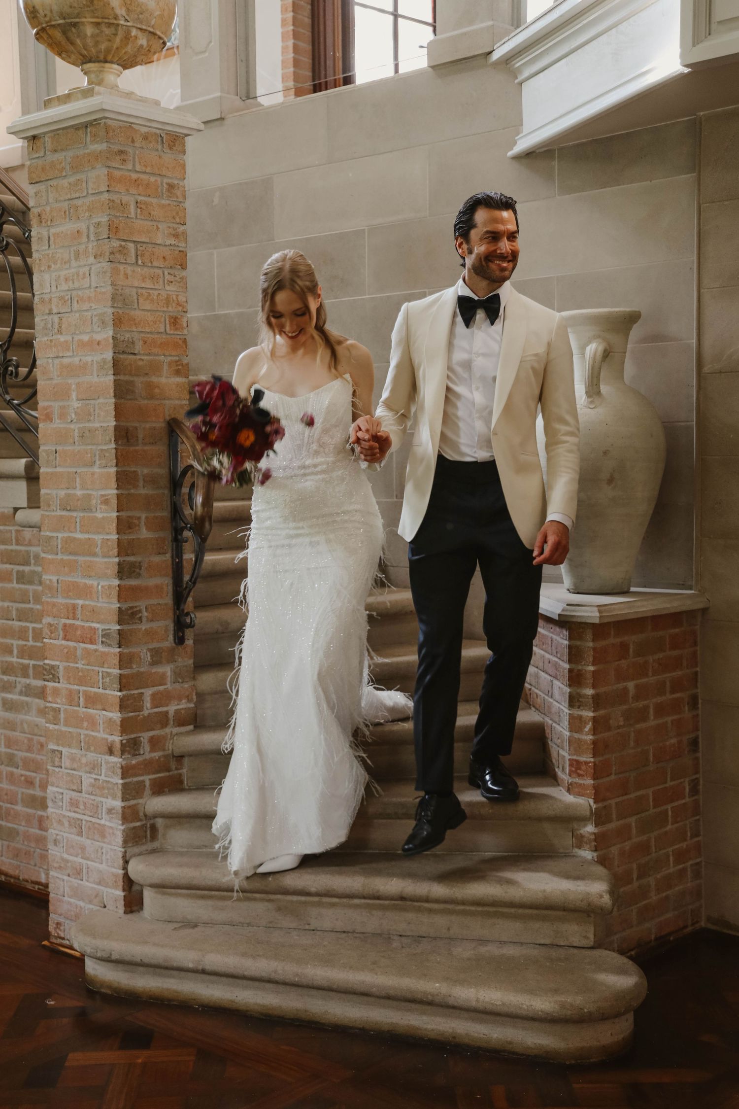 Bride & groom in strairs